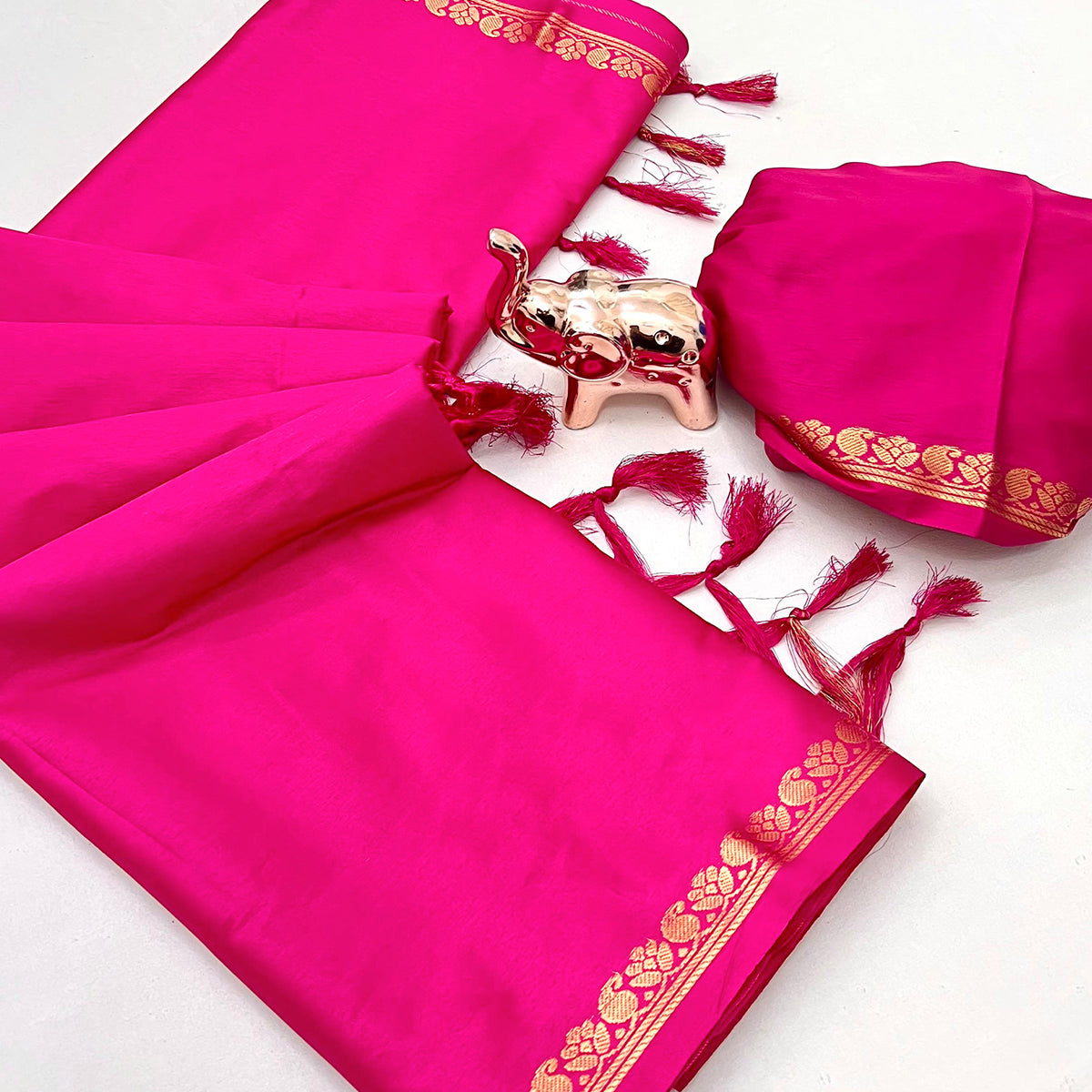 Classic Rani Pink Solid Weaving Mysore Silk Saree Accented With Floral Border & Tassel Pallu