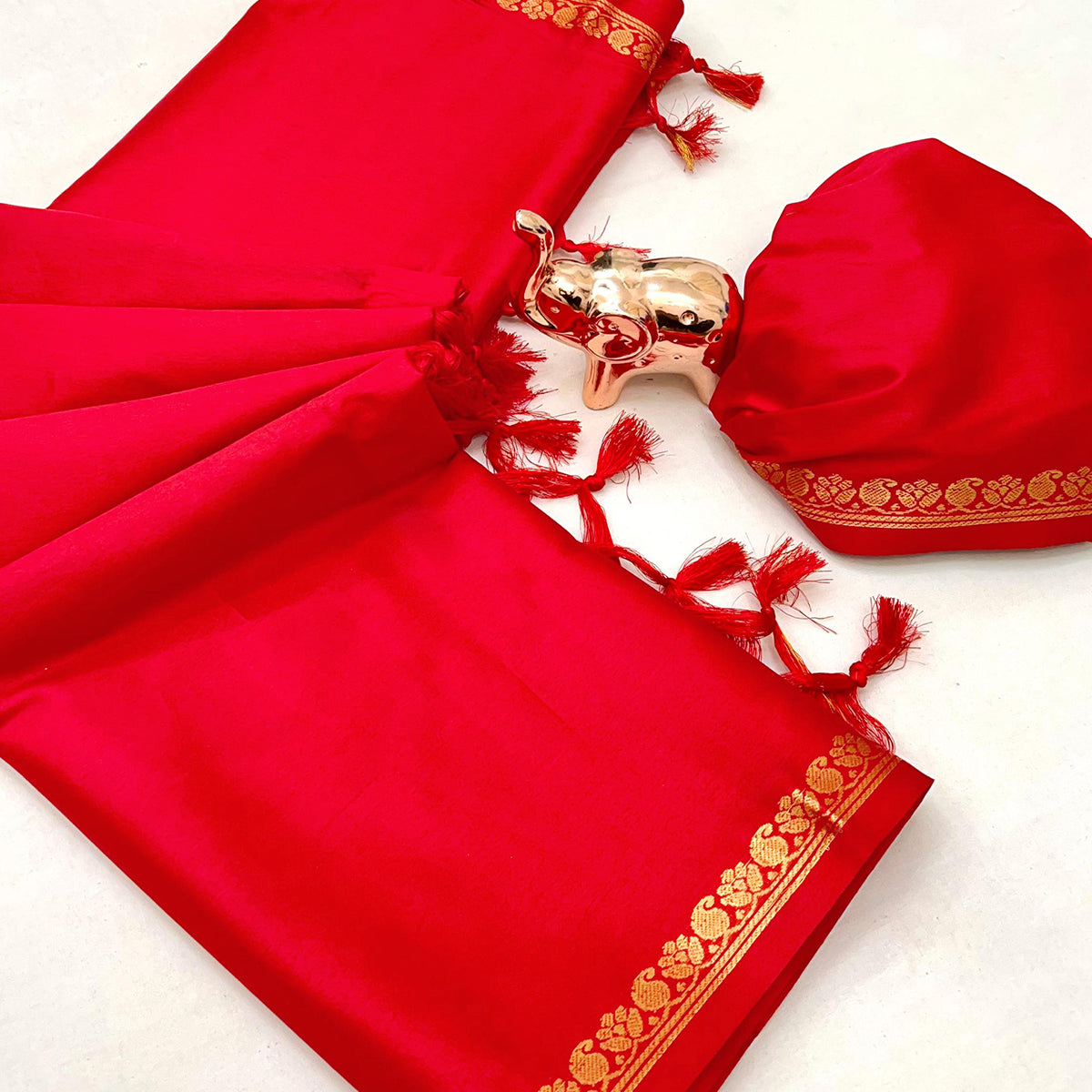 Classic Red Solid Weaving Mysore Silk Saree Accented With Floral Border & Tassel Pallu