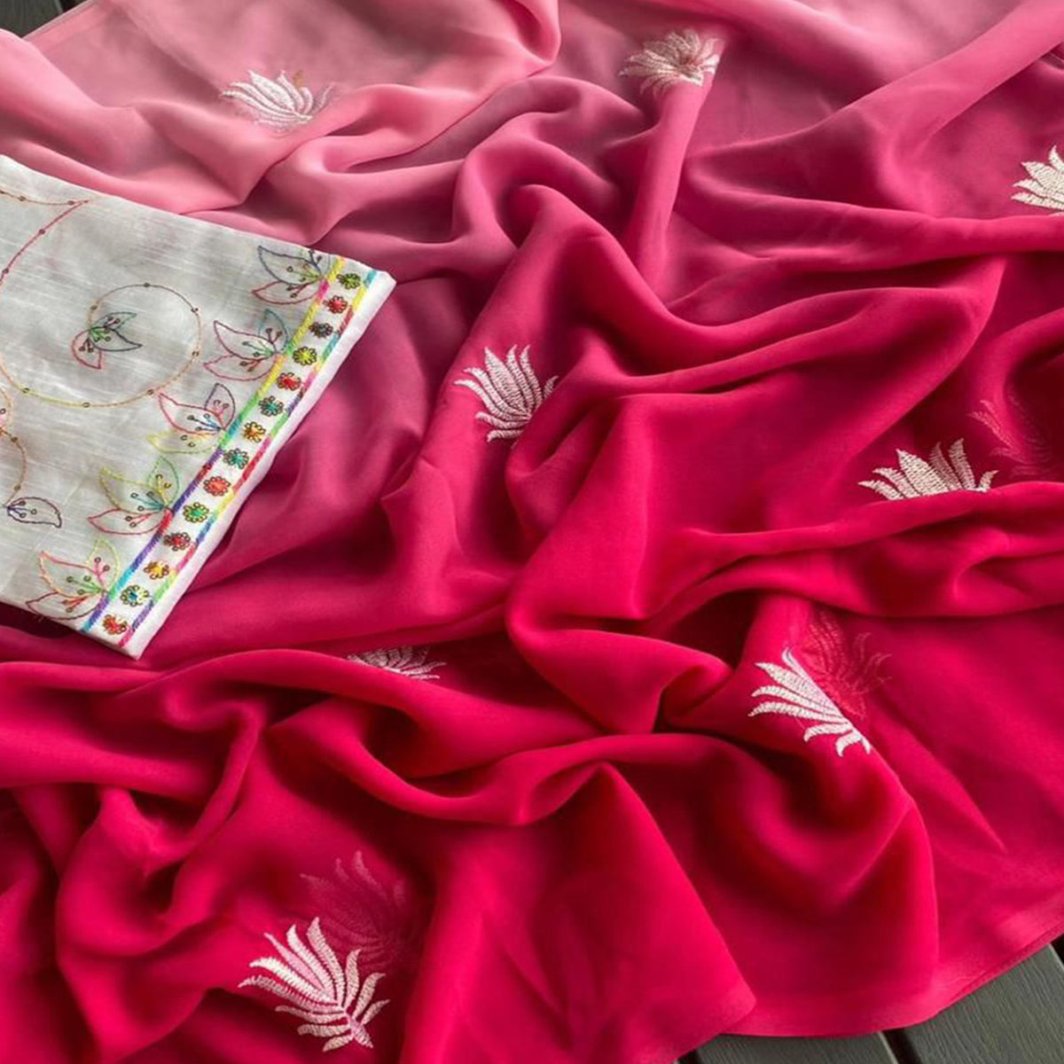 Rani Pink Floral Embroidered Georgette Saree With Tassels