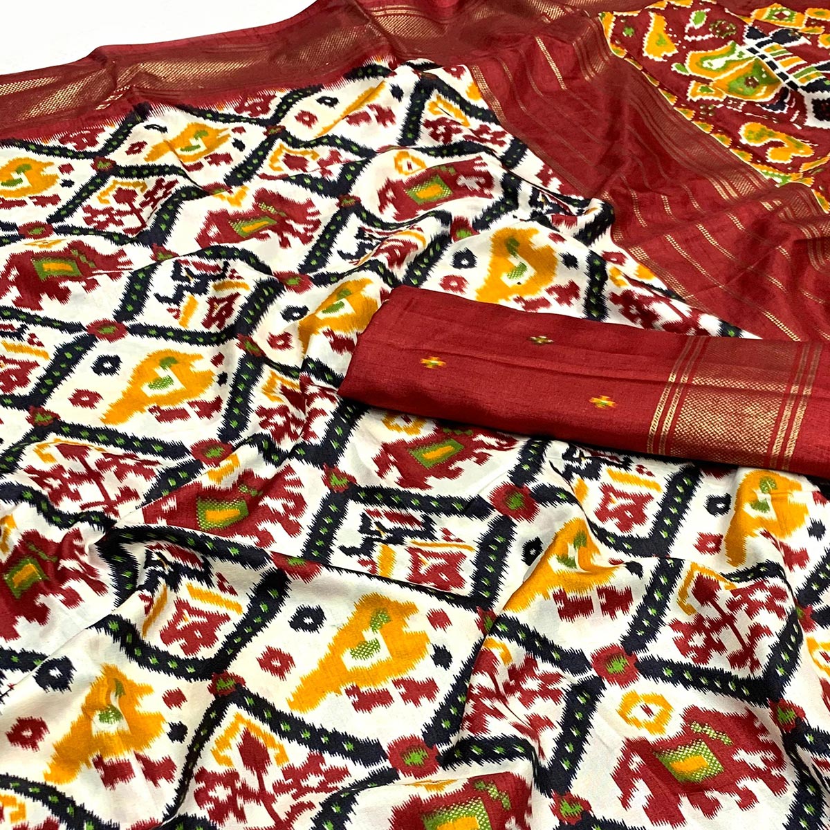 White & Red Patola Printed Dola Silk Saree