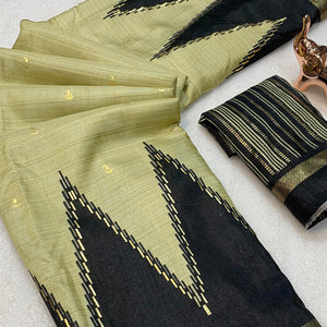 Subtle & Stylish Chikoo Saree With Ikkat Prints In Luxe Dola Silk For Festive Wear