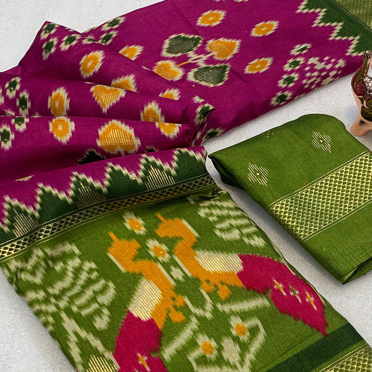 Subtle and Stylish Pink Saree with Ikkat Prints in Luxe Dola Silk for Festive Wear