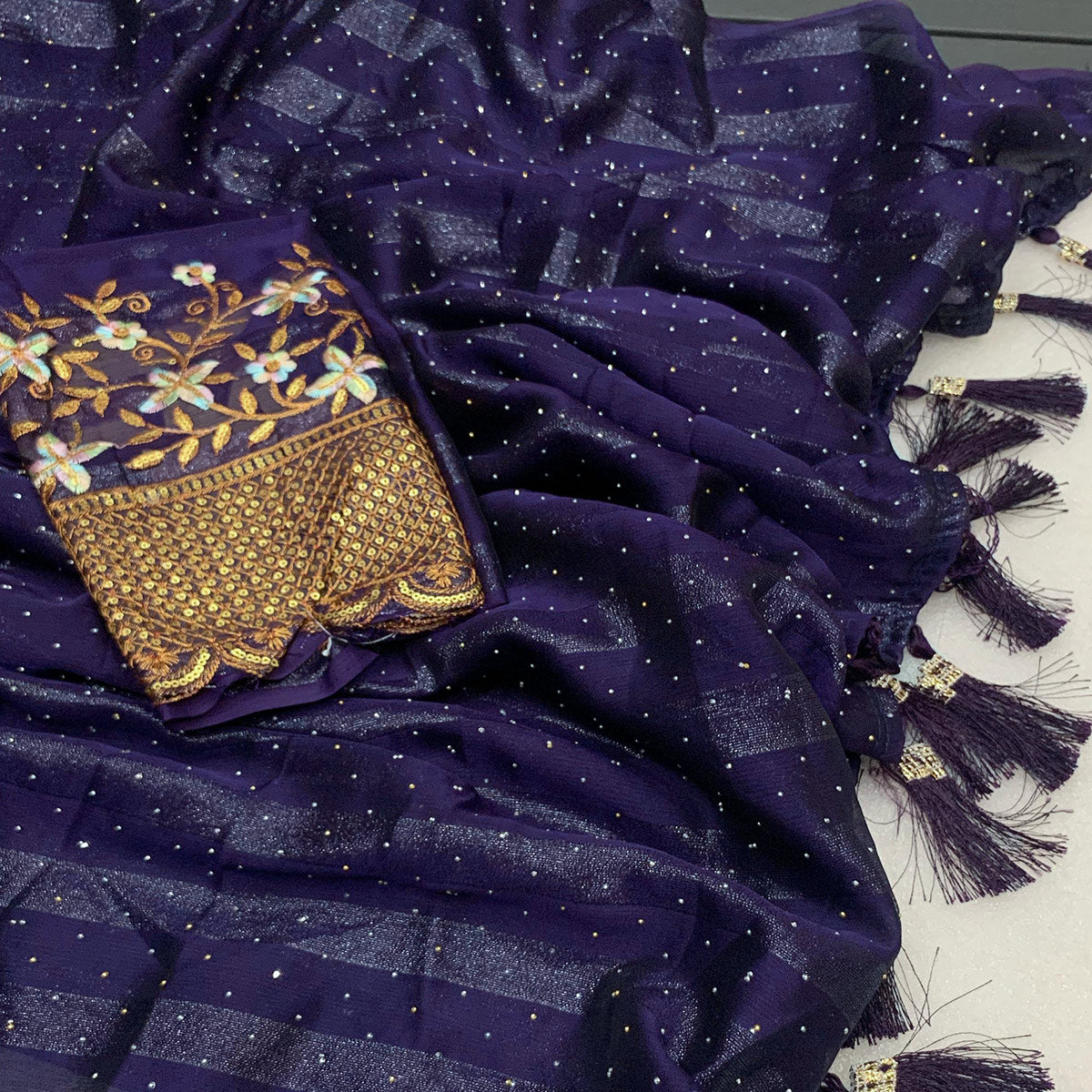 Purple Woven Swaroski Work Georgette Saree With Tassels