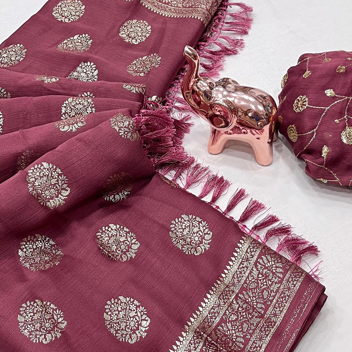 Elegant Mauve Foil Floral Printed Georgette Saree With Tassel Detailing Pallu