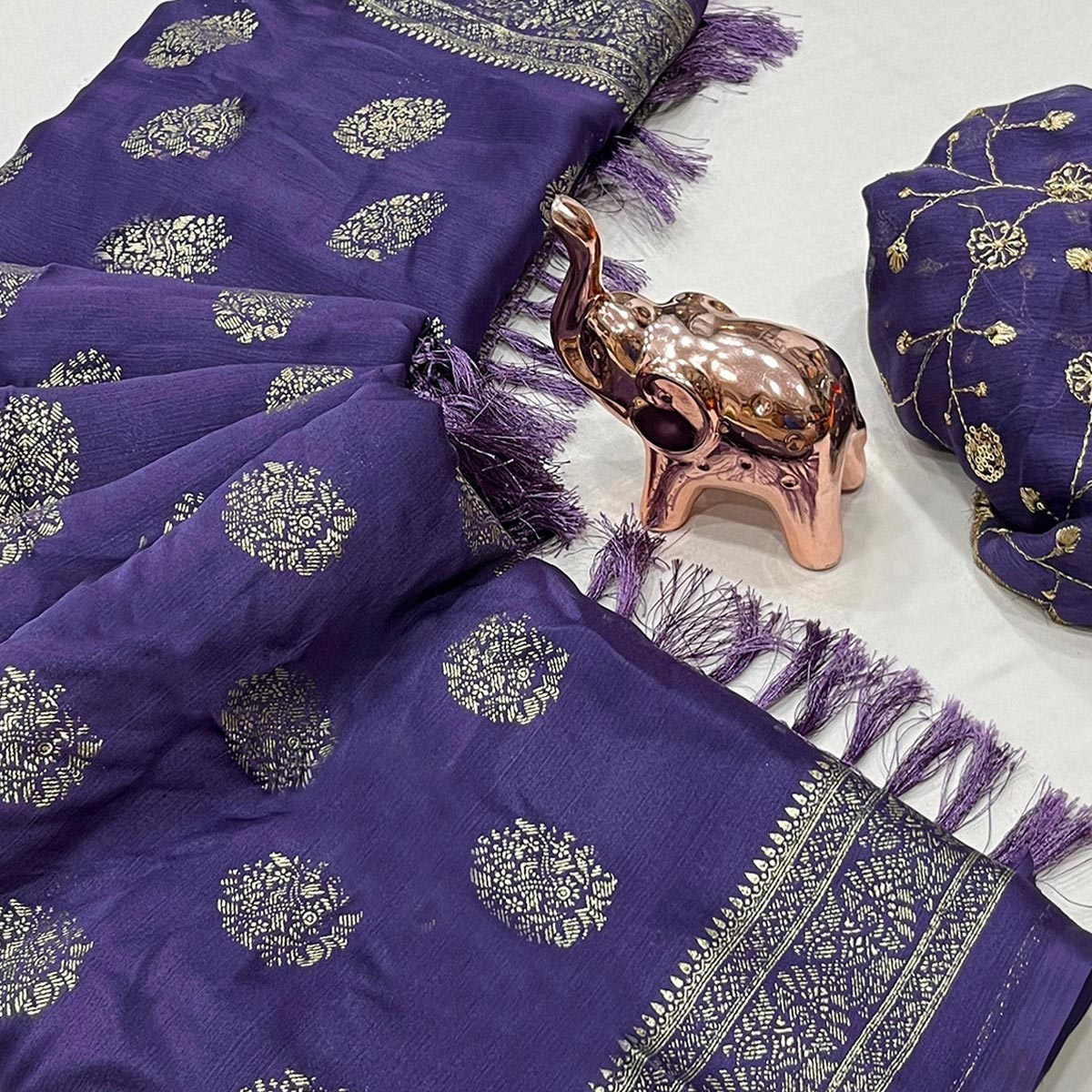 Elegant Purple Foil Floral Printed Georgette Saree With Tassel Detailing Pallu