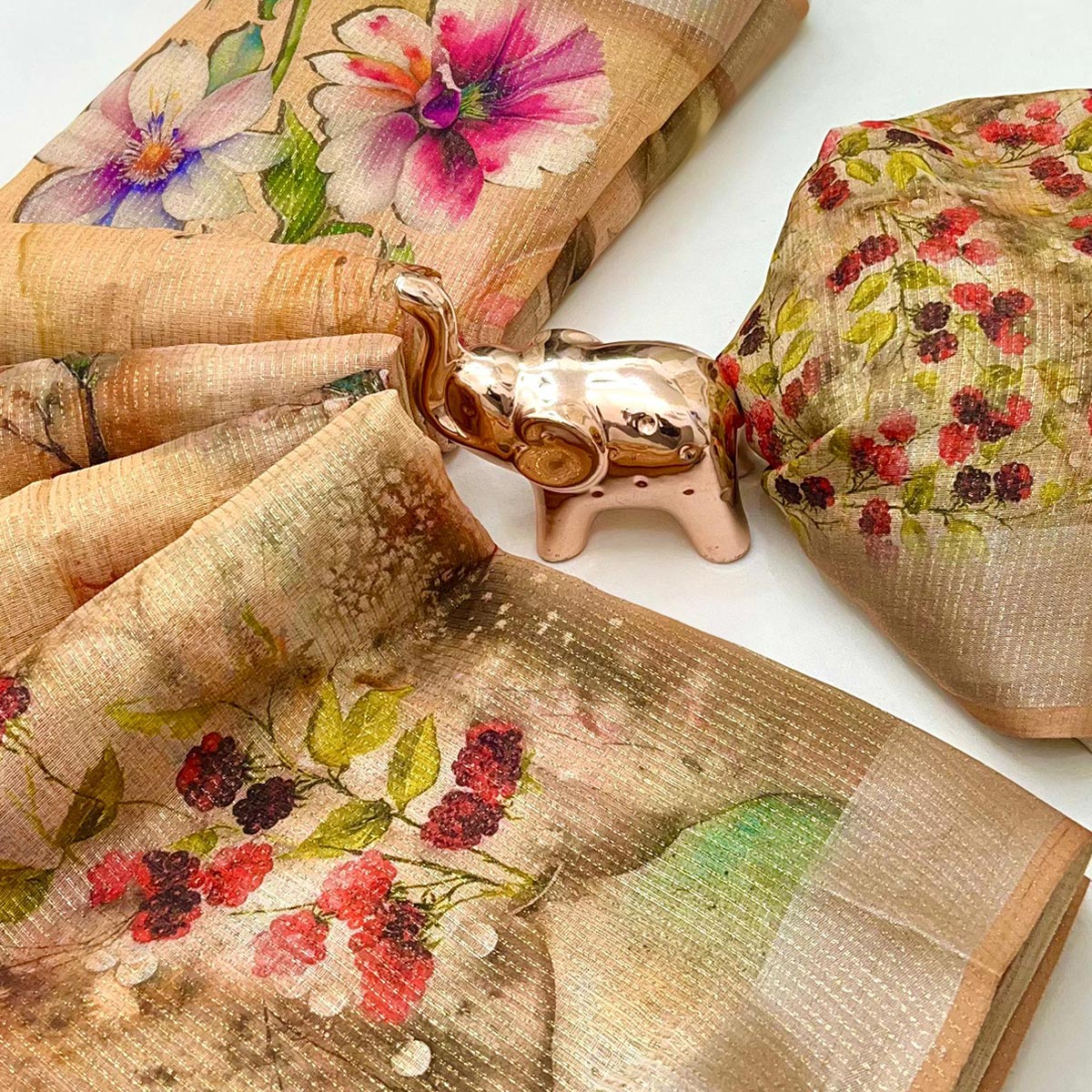 Pretty Warm Peach Shimmer Cotton Saree With Floral Digital Print & Designer Zari Border