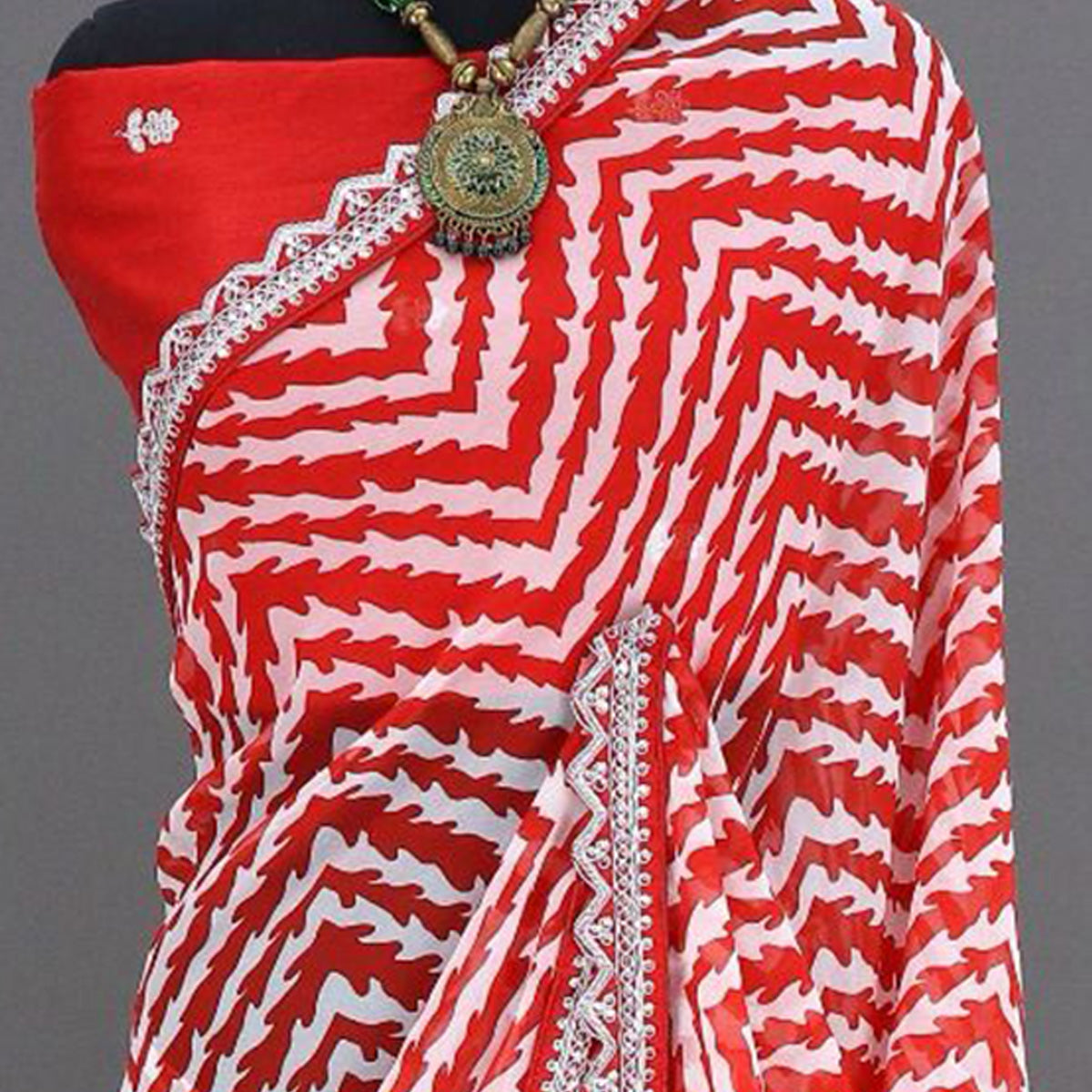 Red Zig Zag Printed Georgette Saree With Sequins Embroidered Border