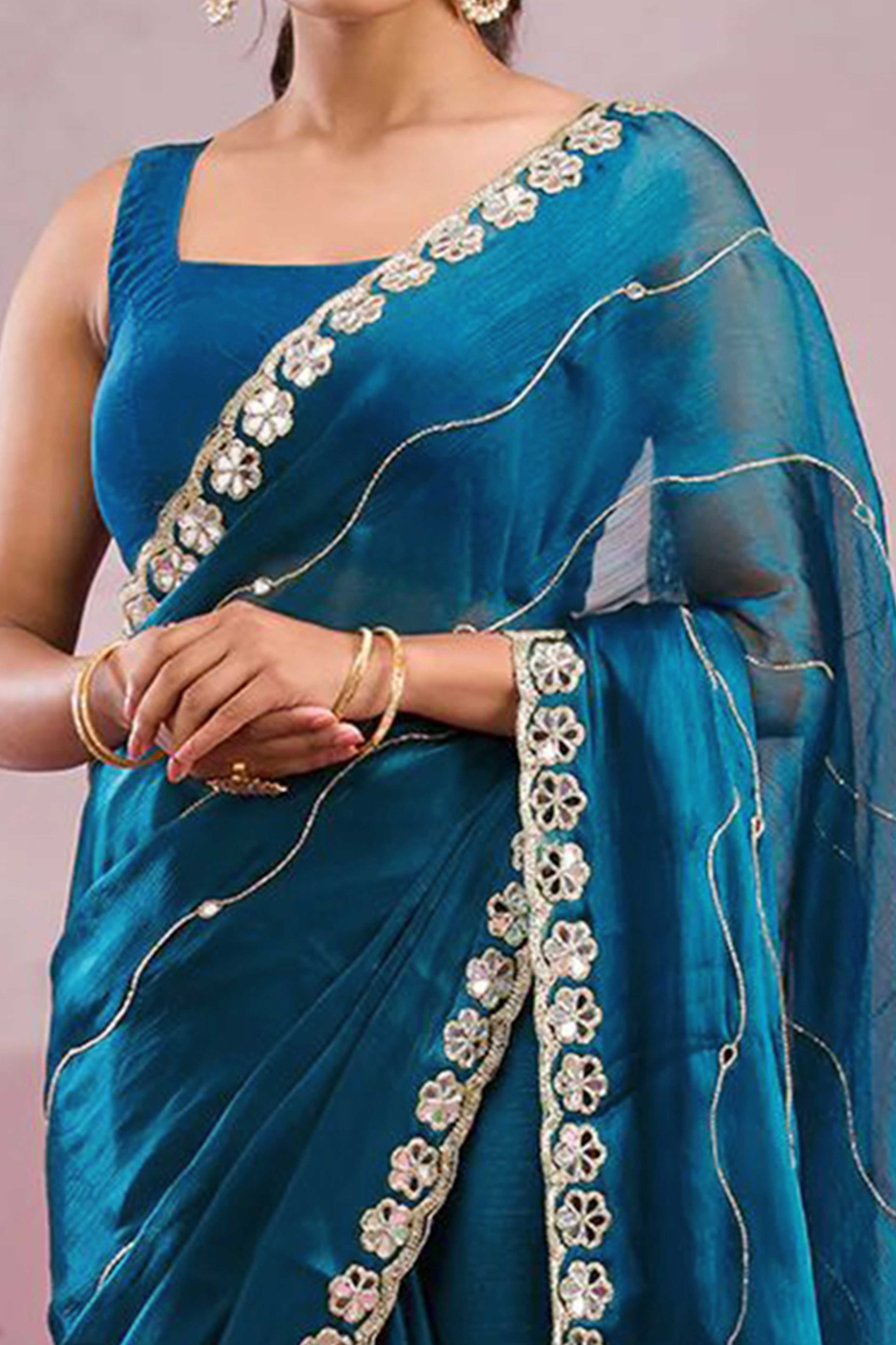 Teal Art Silk Saree Highlighted with Embroidery & Mirror Detailing