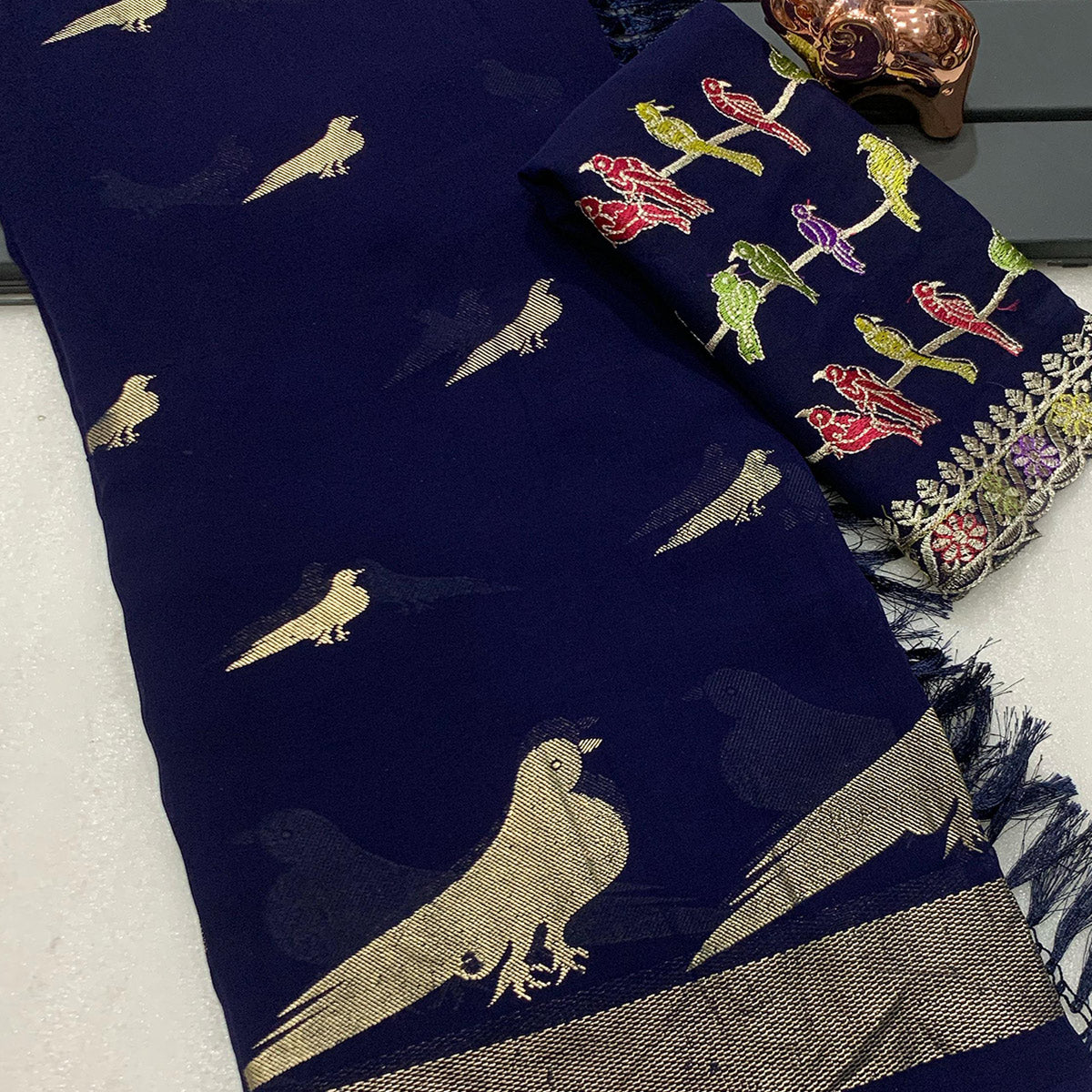 Blue Georgette Saree Adorned With Elegant Bird Embroidery