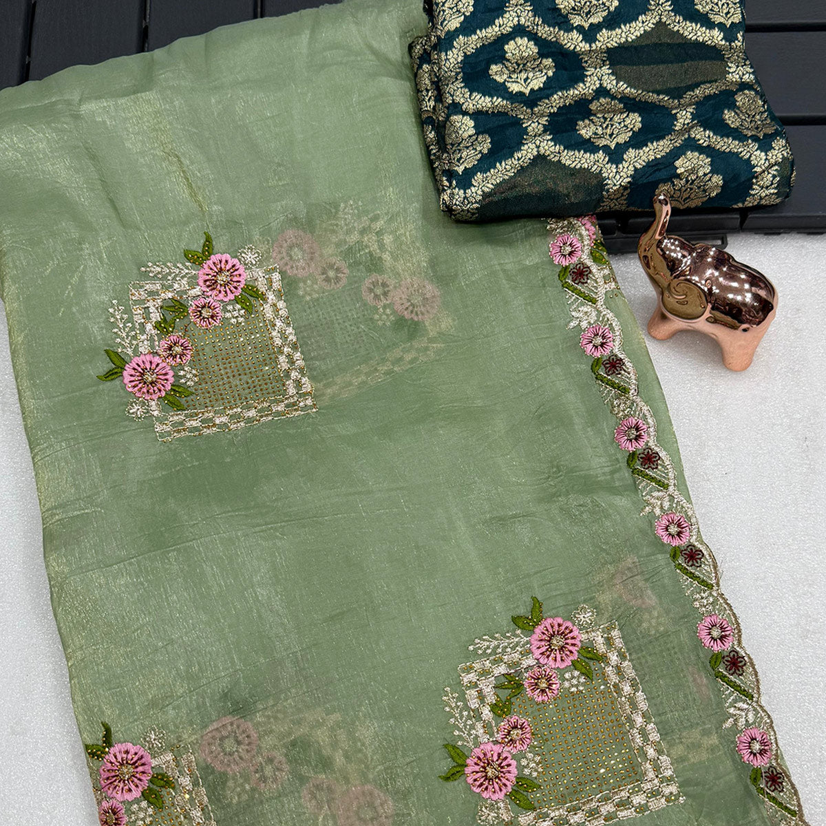 Stunning Sage Green Floral Embroidery & Swarovski Adorned Paper Silk Saree with Cutwork Border