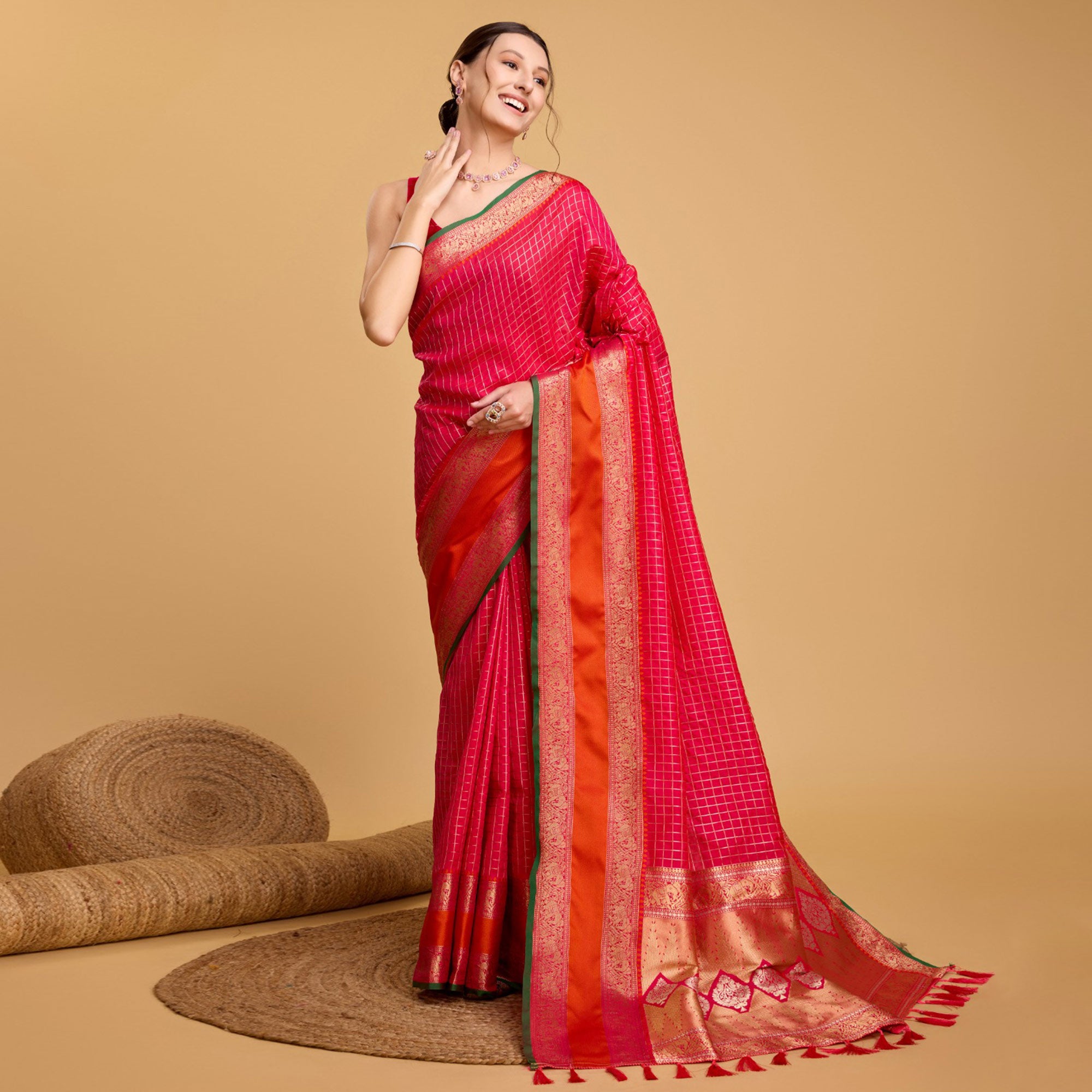 Pink Checks Woven Pure Silk Saree With Tassels