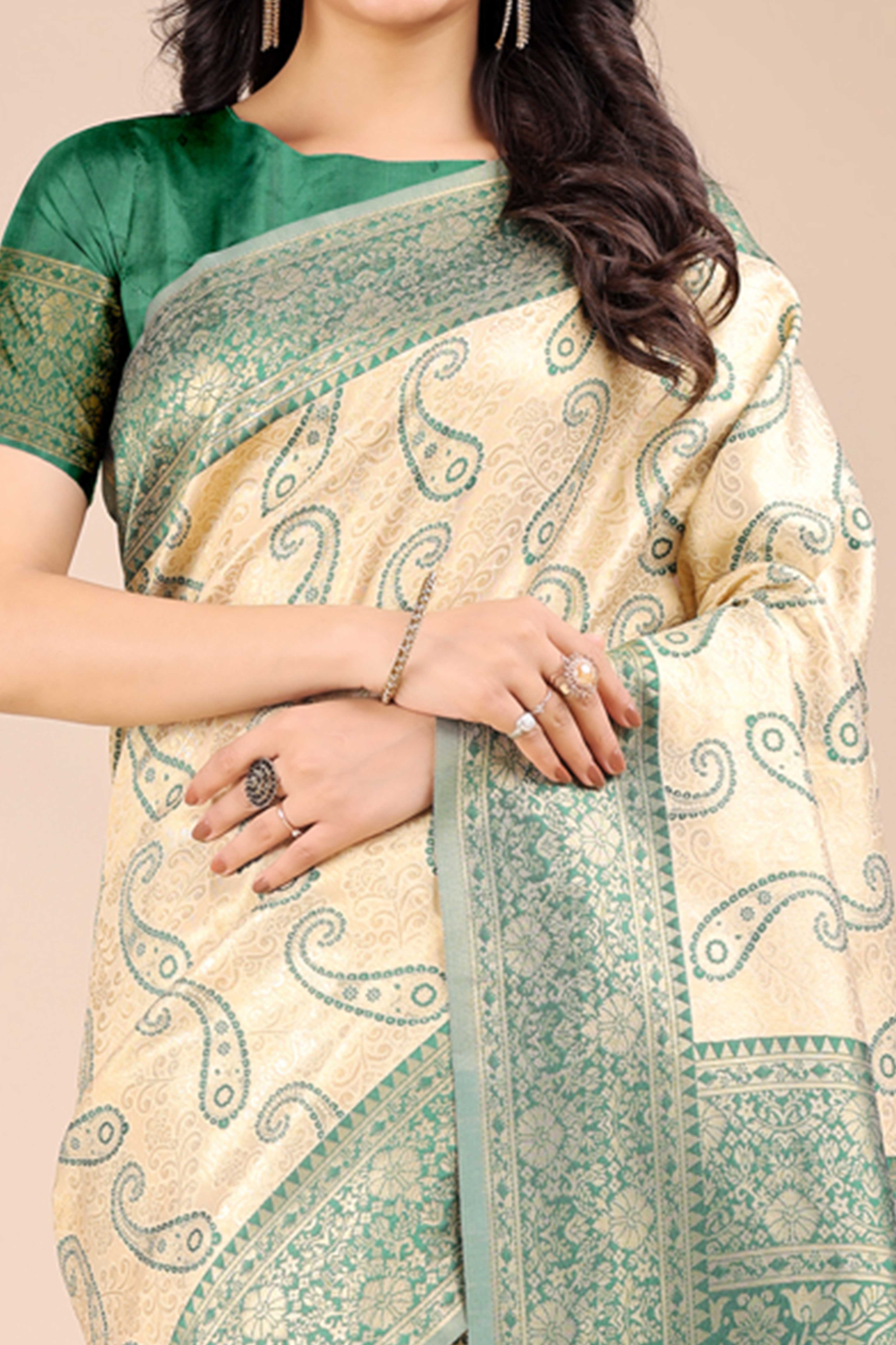 Cream Banarasi Silk Saree Featuring Green Floral Zari Weaving and a Rich Contrast Border