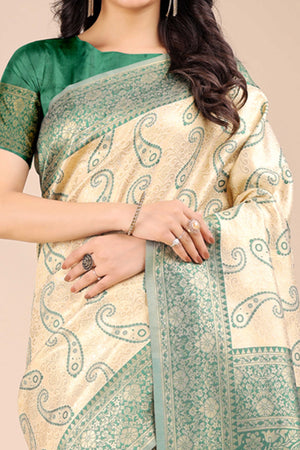 Cream Banarasi Silk Saree Featuring Green Floral Zari Weaving and a Rich Contrast Border