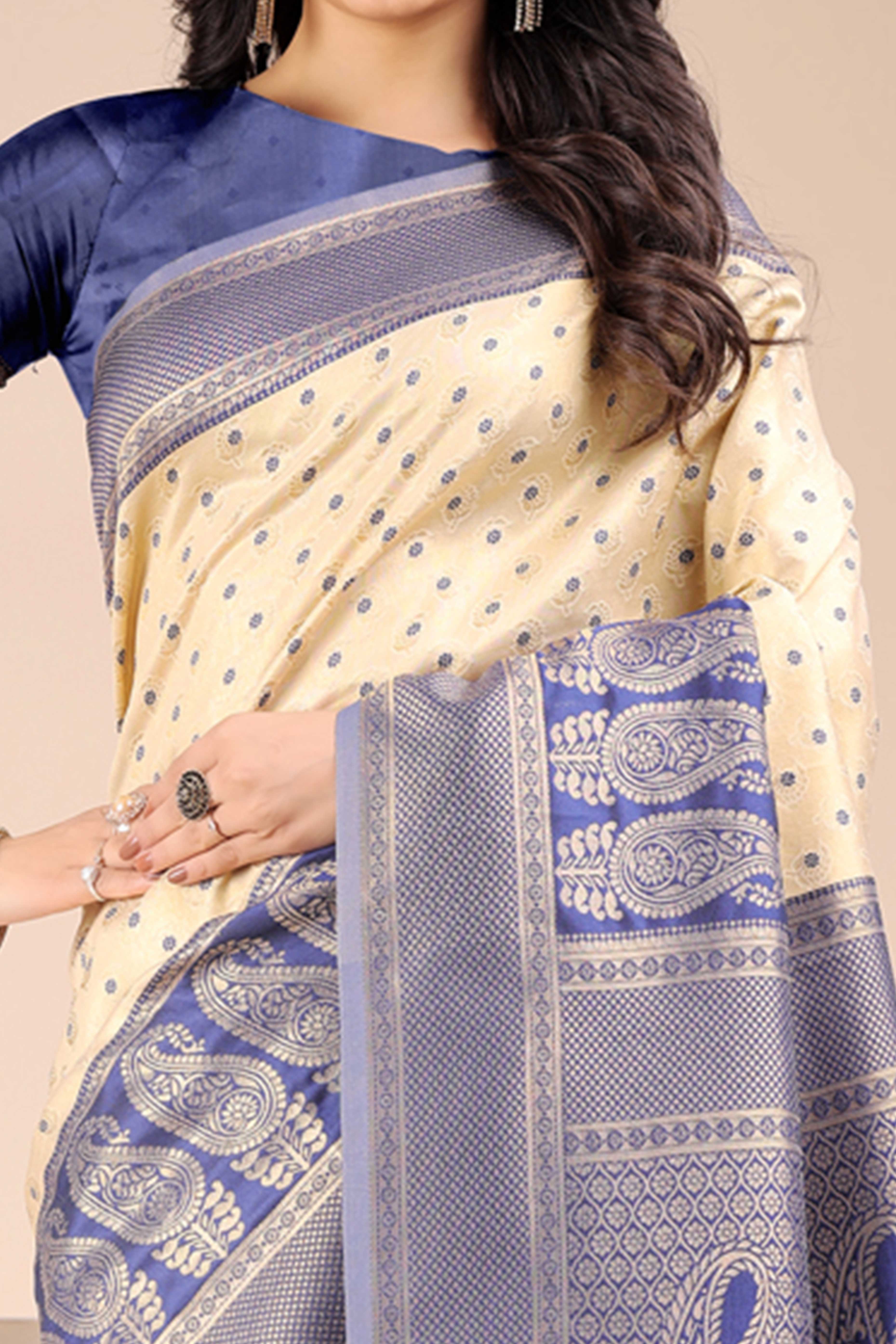 Cream Banarasi Silk Saree Featuring Lustrous Navy Blue Floral Zari Weaving and a Rich Contrast Border