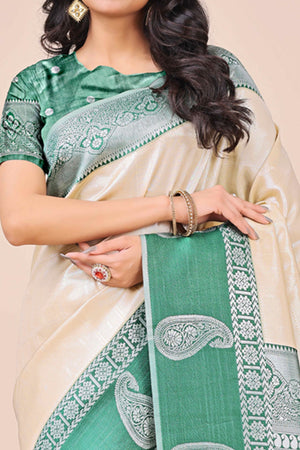 Cream Lichi Silk Blend Saree With Intricate Paisley Zari Weave & Graceful Tassels