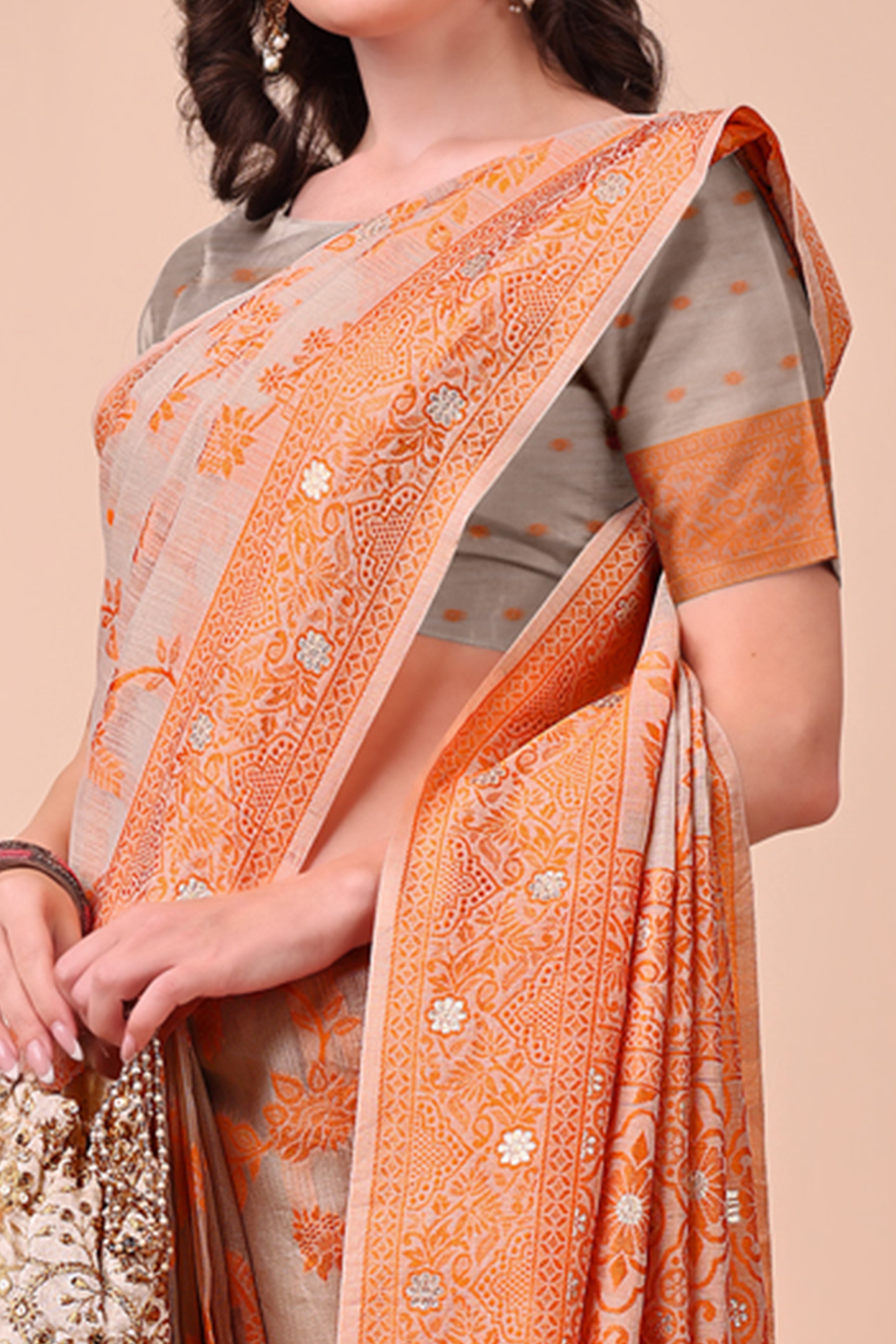 Orange Floral Zari Woven Cotton Blend Saree With Delicate Tassel Detailing