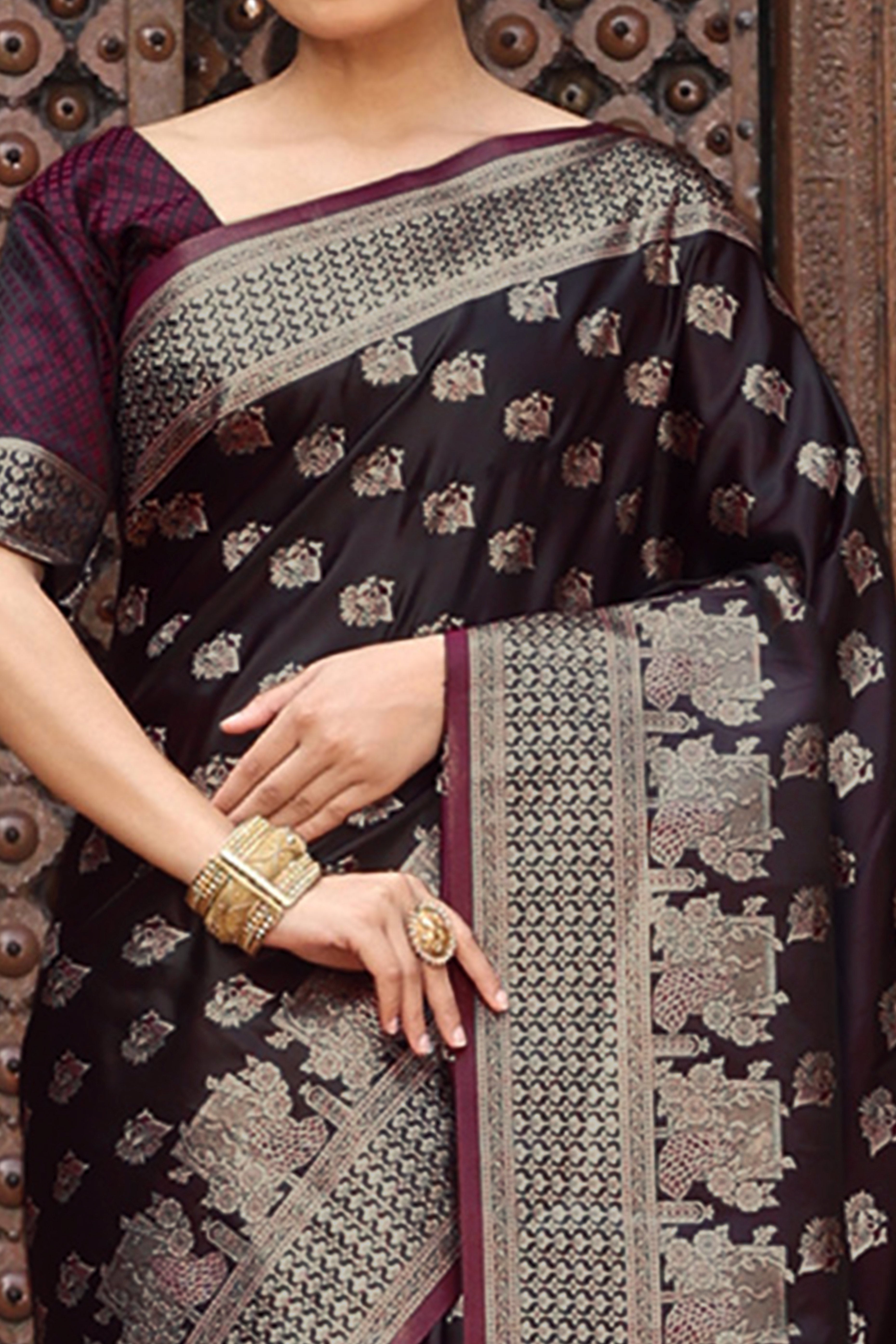 Designer Wine Saree Showcasing Peacock & Floral Zari Weaving With Handmade Tassel Pallu