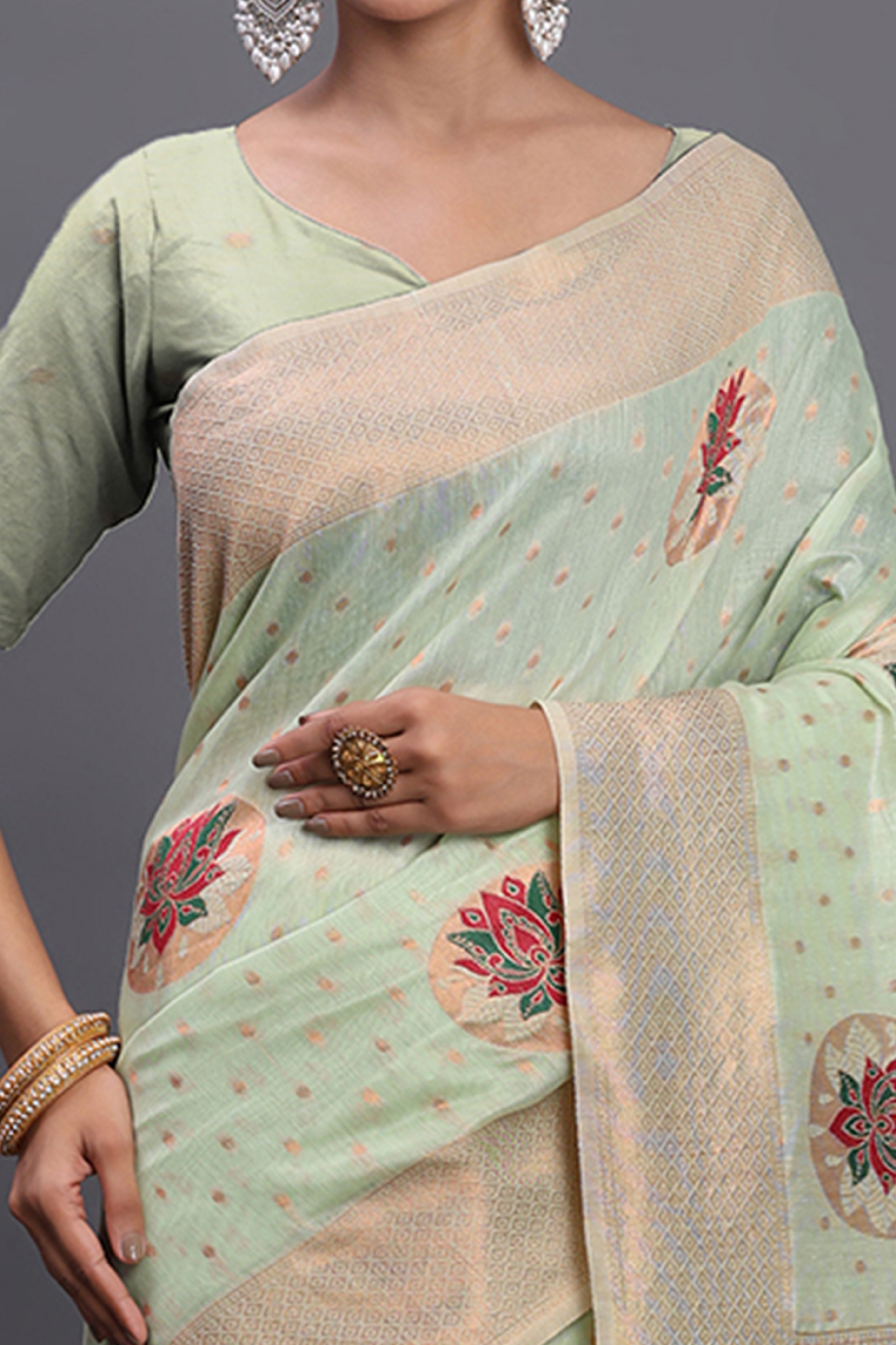 Stylish Light Green Floral Zari Weaving Linen Cotton Saree With Graceful Tassel Pallu