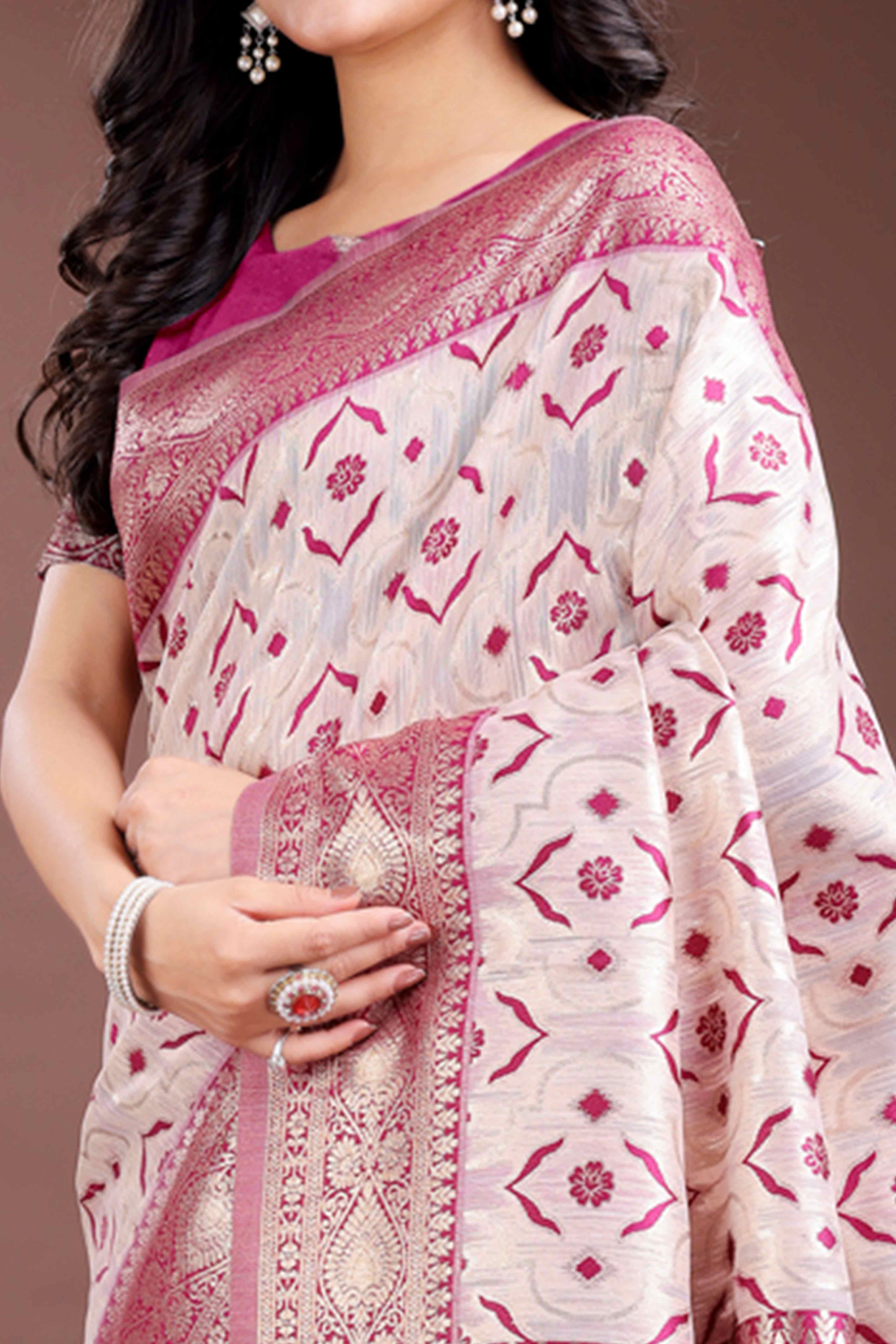 Vibrant Magenta Traditional Ikkat Style Zari Weaving Cotton Blend Saree with Bold Tassel Accents