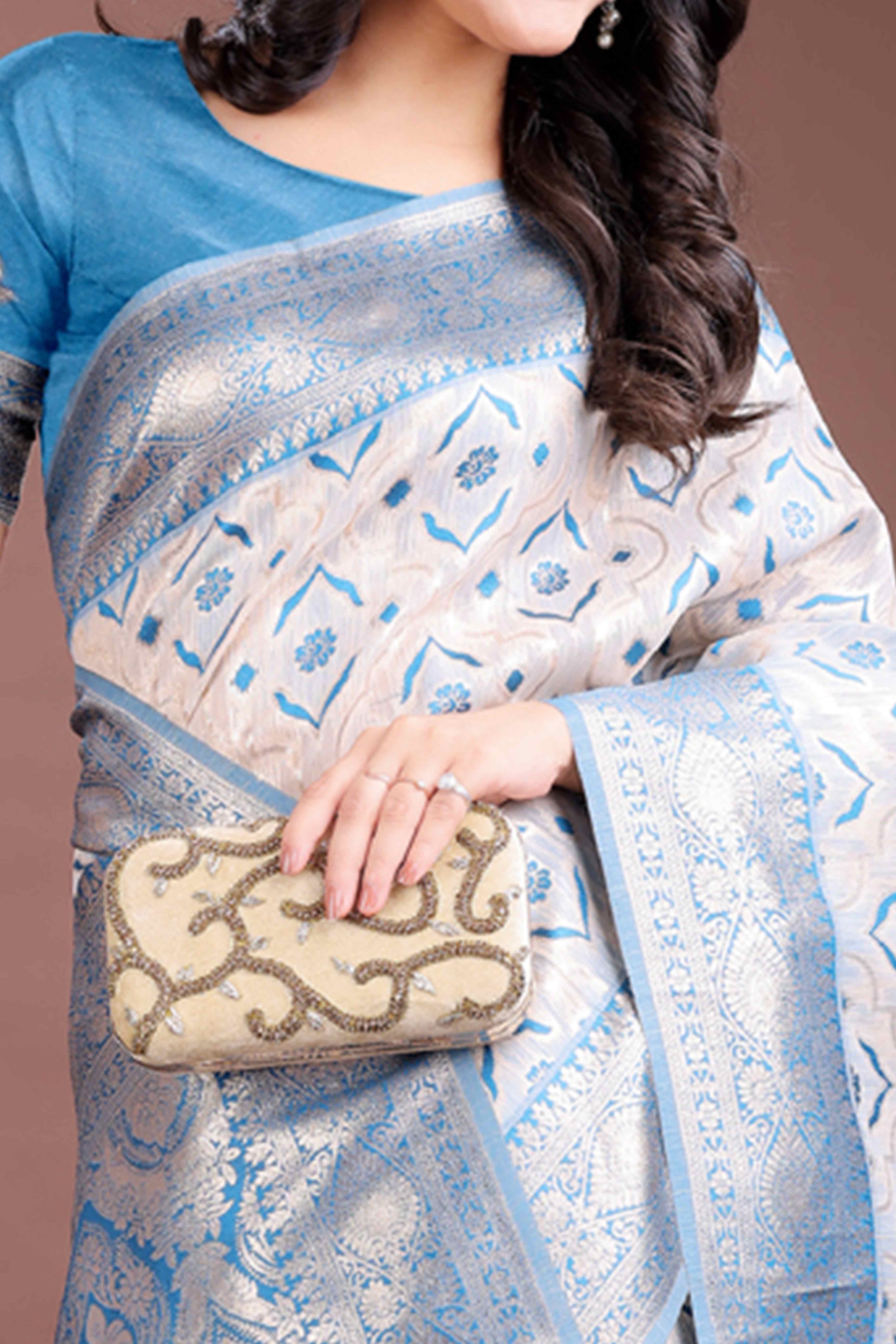 Tranquil Sky Blue Traditional Ikkat Style Zari Weaving Cotton Blend Saree with Charming Tassel Details