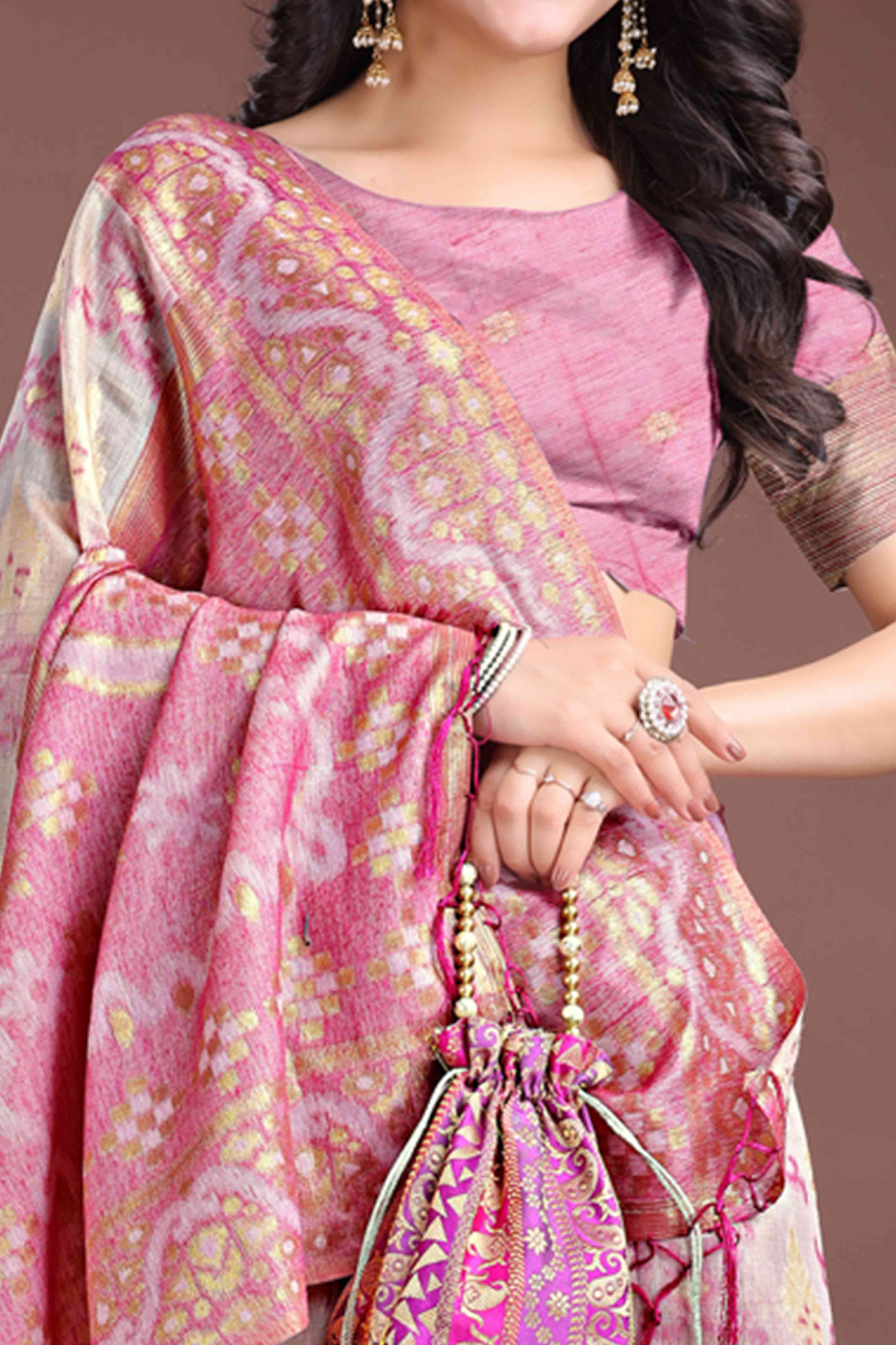 Graceful Pink Traditional Ikkat Style Zari Weaving Cotton Blend Saree with Lovely Tassel Accents