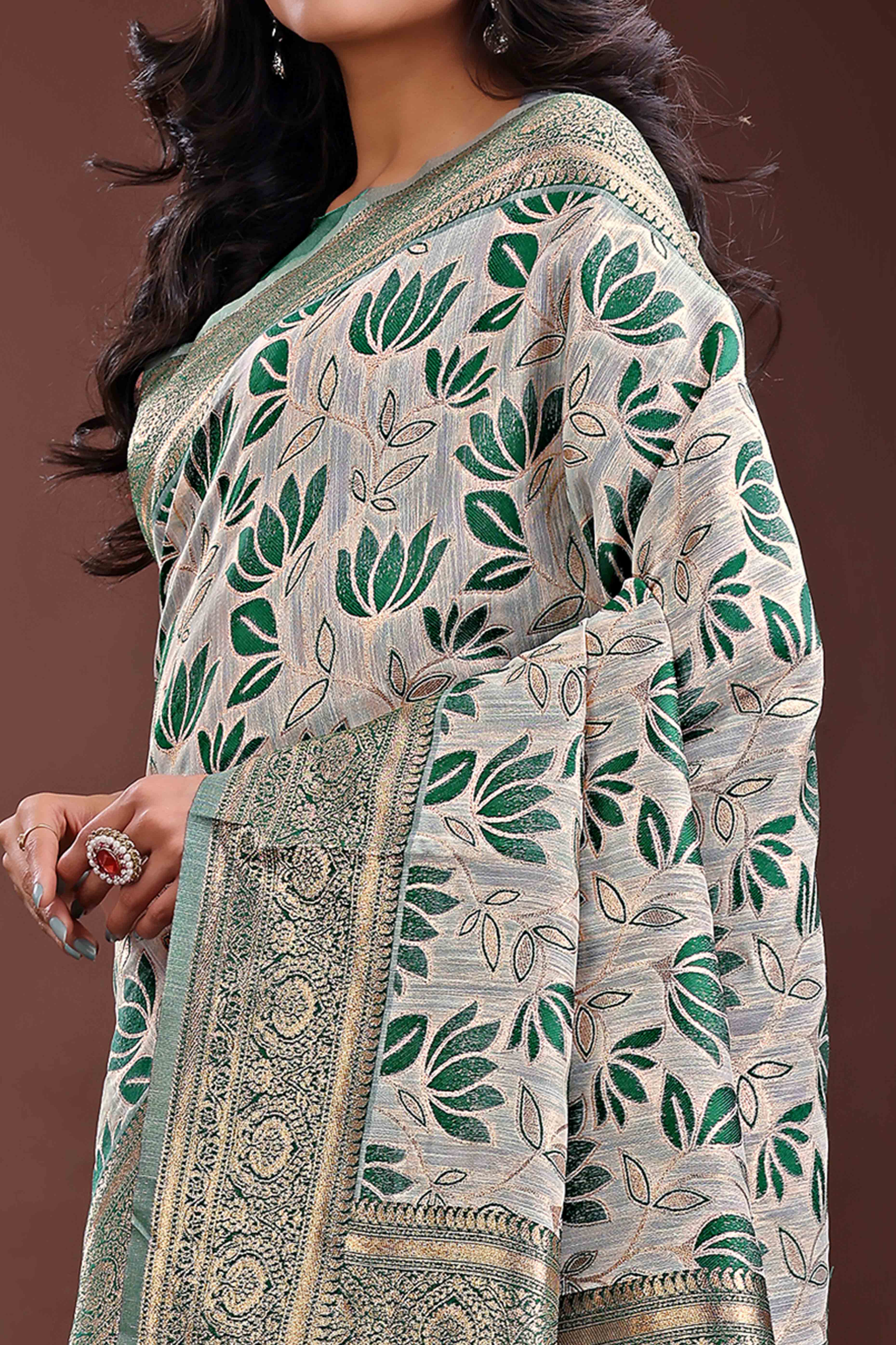 Green Linen Cotton Saree Featuring Graceful Floral Patterns in Zari Weave