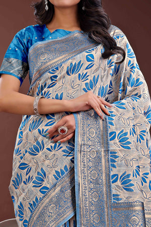 Blue Linen Cotton Saree Featuring Graceful Floral Patterns in Zari Weave