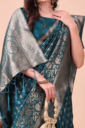 Teal Saree In Lichi Silk Blend With Floral Zari Weaving & Delicate Tassel Border