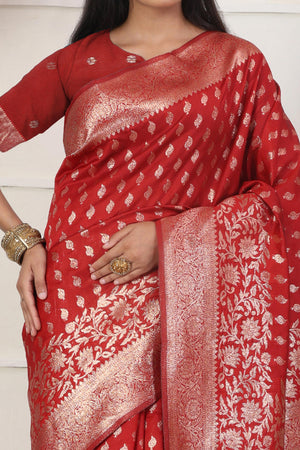 Red Traditional Lichi Silk Blend Saree Enhanced With Floral Zari Weaving & Tassel Pallu