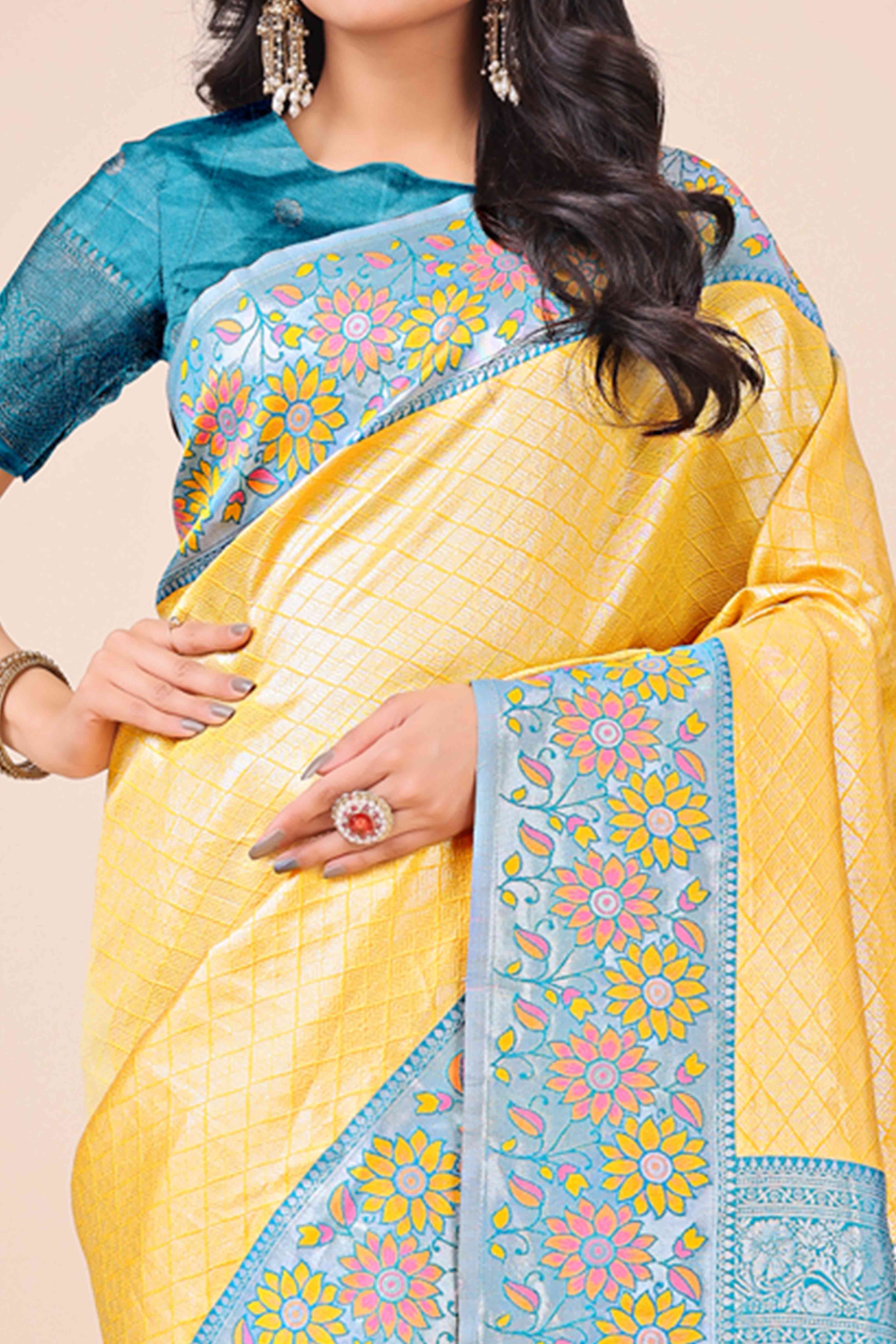 Yellow Lichi Silk Blend Saree With Exquisite Floral Weaving & Graceful Tassel Details