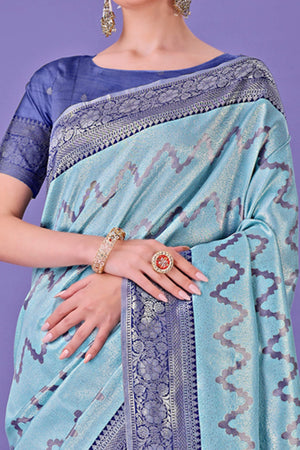Sky Blue Lichi Cotton Silk Saree Adorned With Floral Zari Weave & Tassels