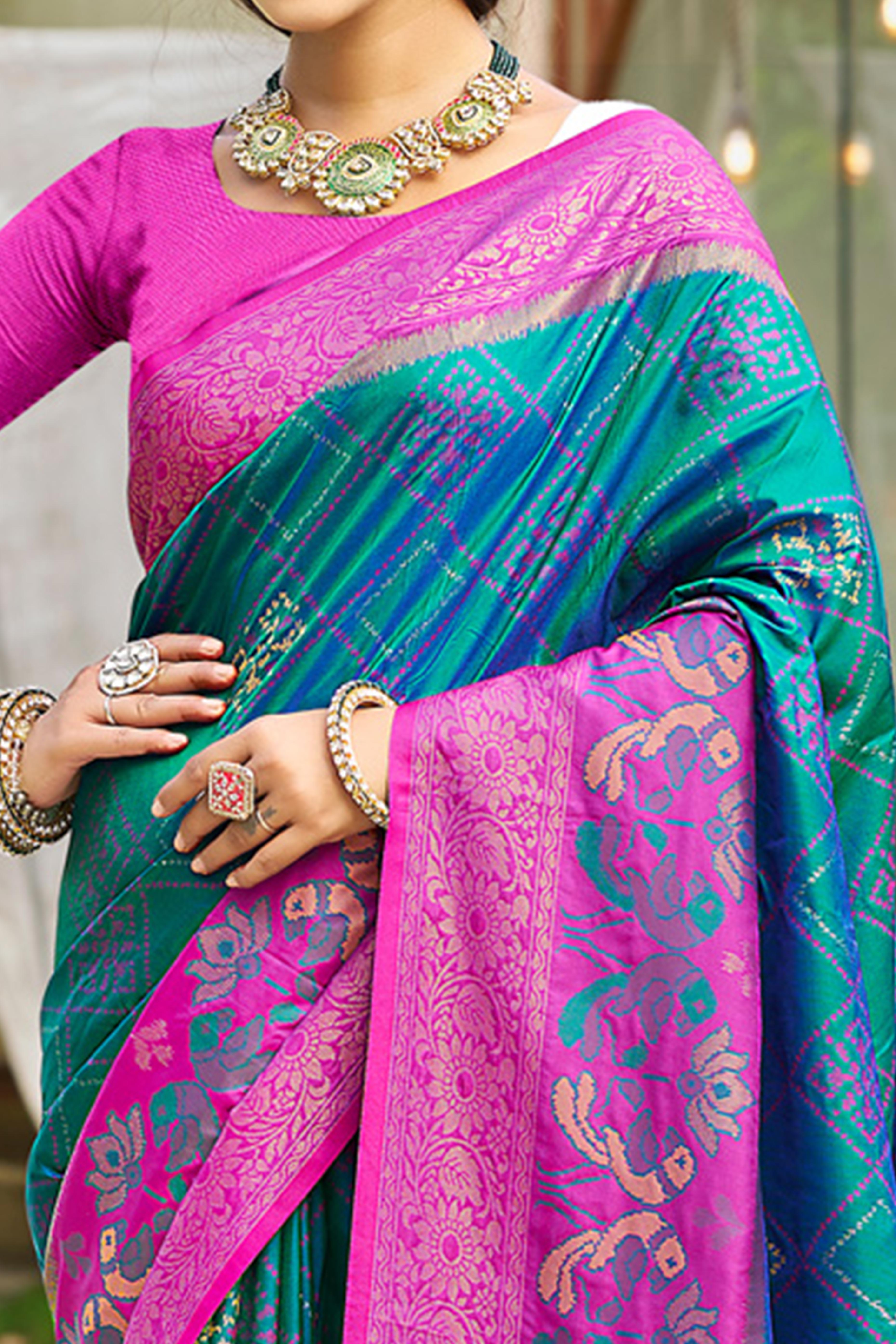 Graceful Morpich Blue Pochampally Silk Blend Saree Adorned With Floral Weaving & Tassel Pallu