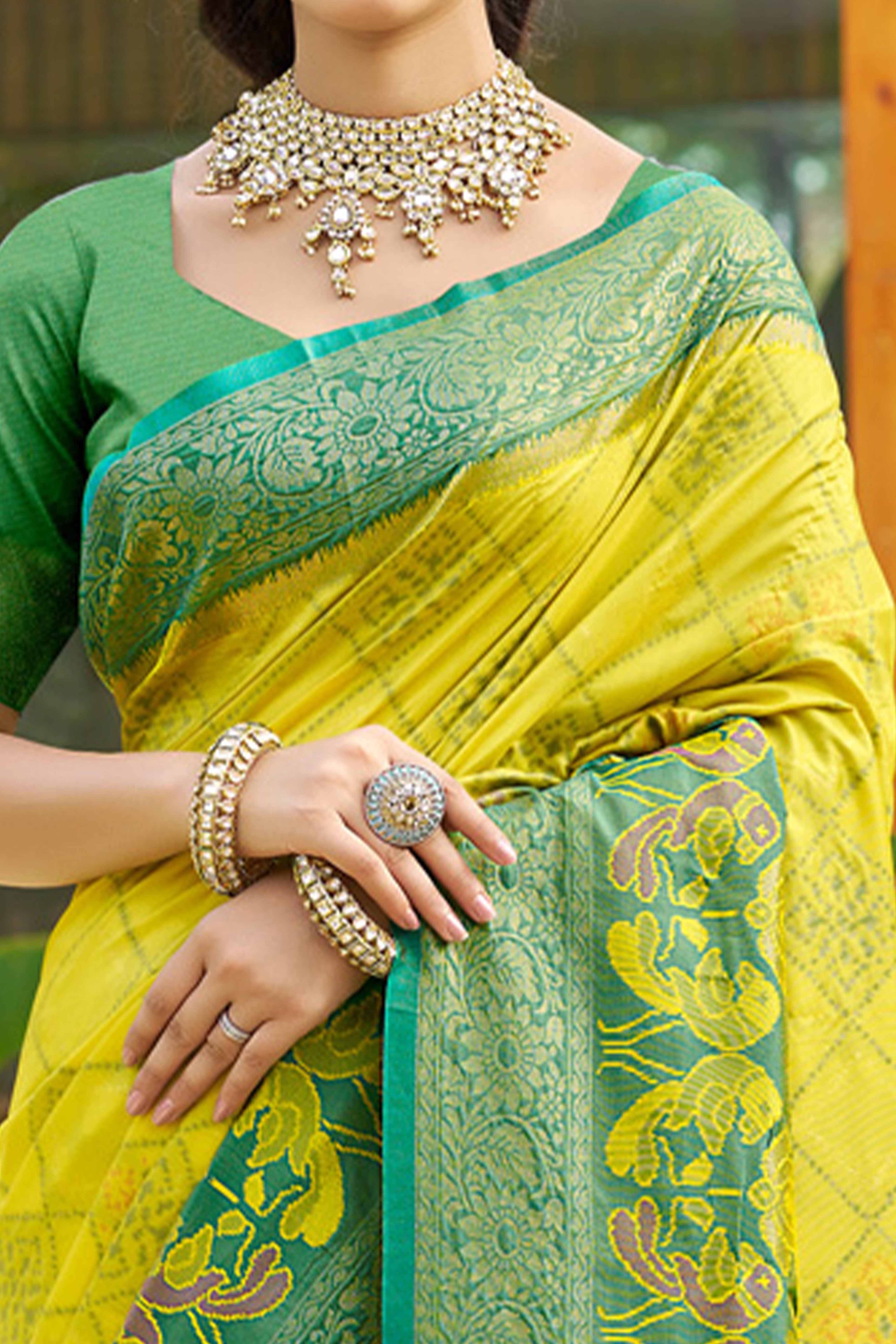 Graceful Lemon Yellow Pochampally Silk Blend Saree Adorned With Floral Weaving & Tassel Pallu