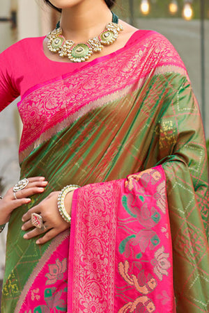 Graceful Mehendi Green Pochampally Silk Blend Saree Adorned With Floral Weaving & Tassel Pallu