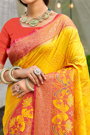 Graceful Yellow Pochampally Silk Blend Saree Adorned With Floral Weaving & Stylish Tassel Pallu