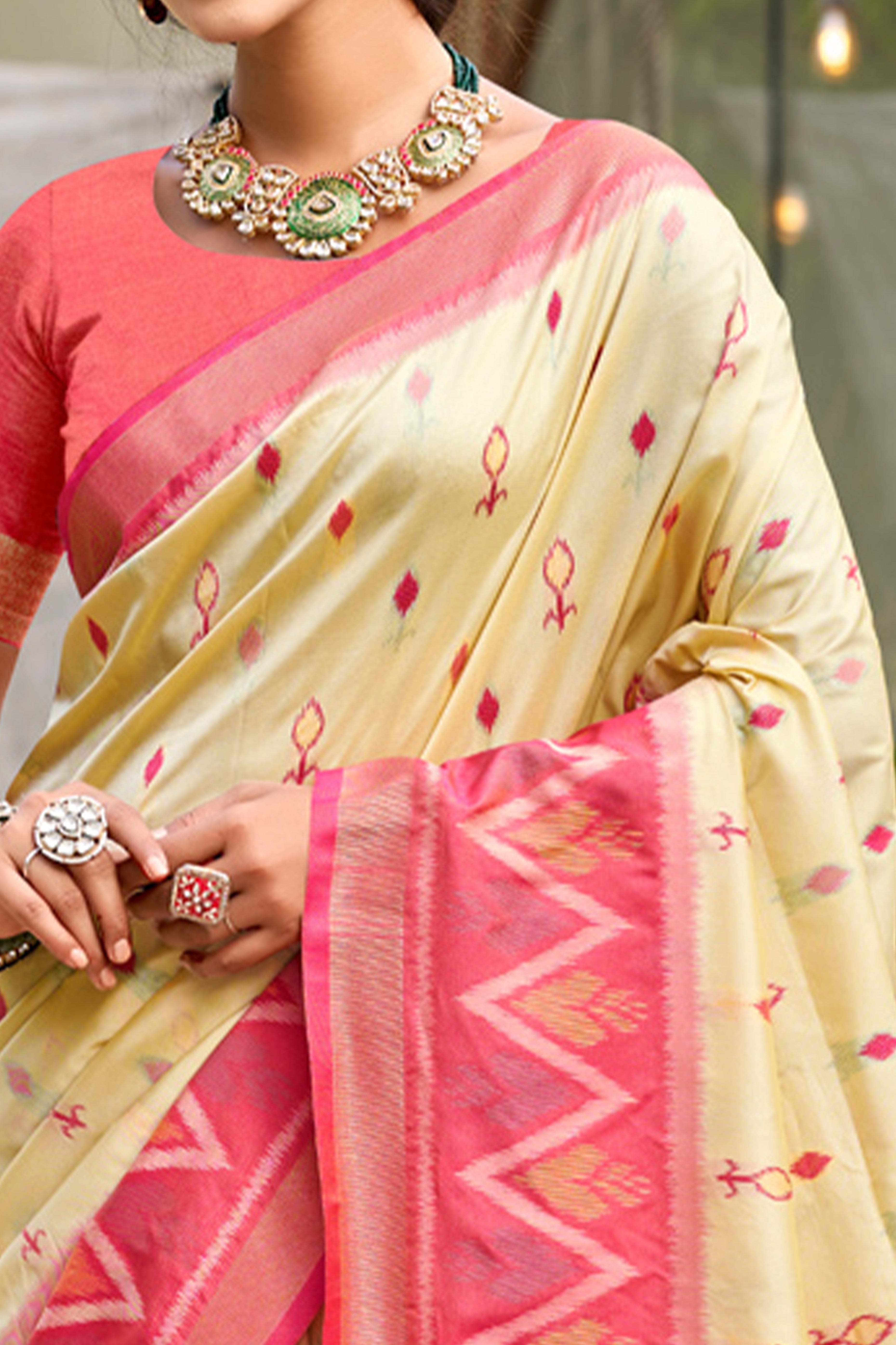 Elegant Cream Pochampally Ikkat Silk Blend Saree Featuring Intricate Weaving & Tassel Pallu