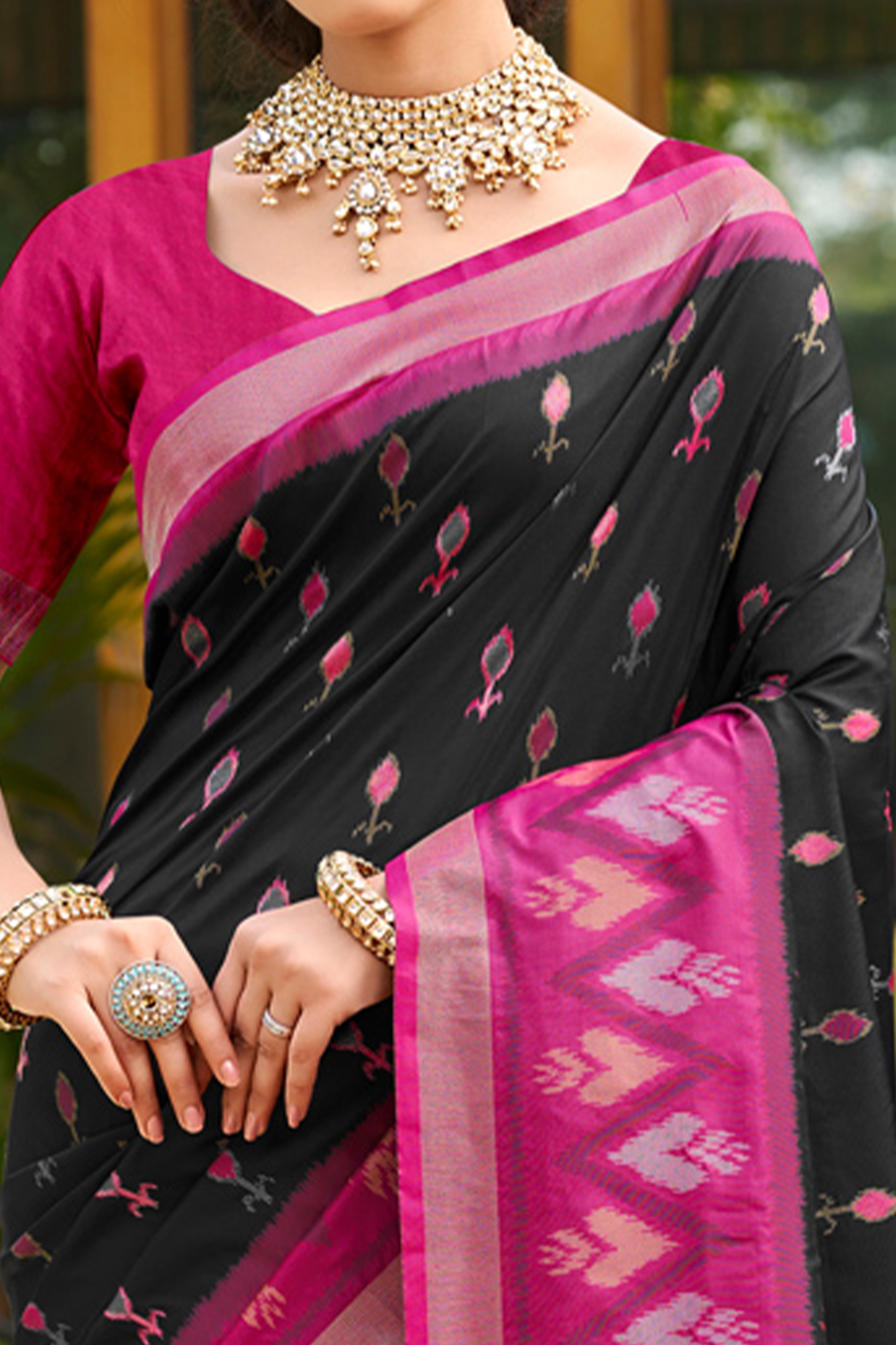 Elegant Black Pochampally Ikkat Silk Blend Saree Featuring Intricate Weaving & Tassel Pallu