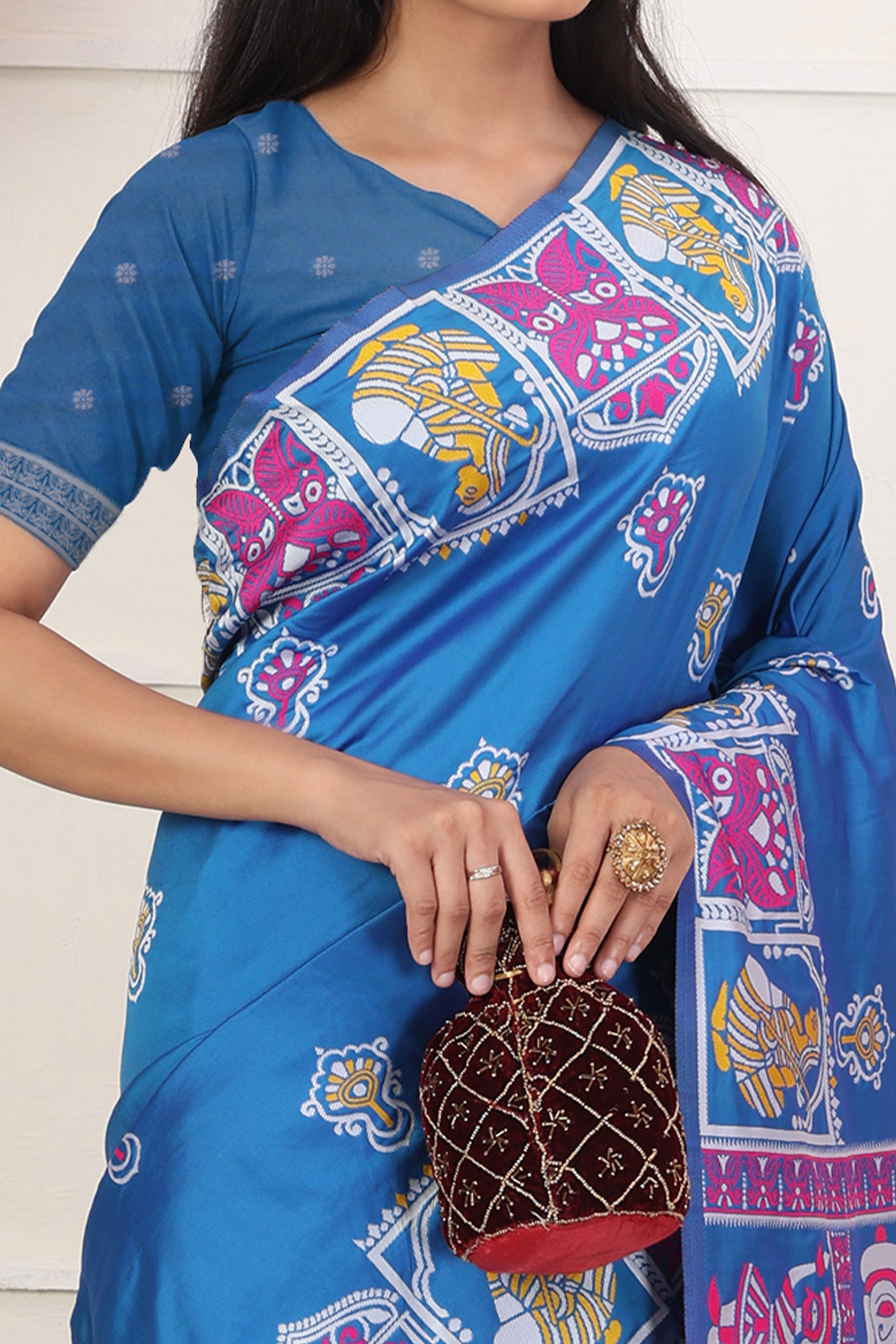 Blue Ethnic Madhubani Print Silk Blend Saree Enhanced With Tassel Pallu Accents