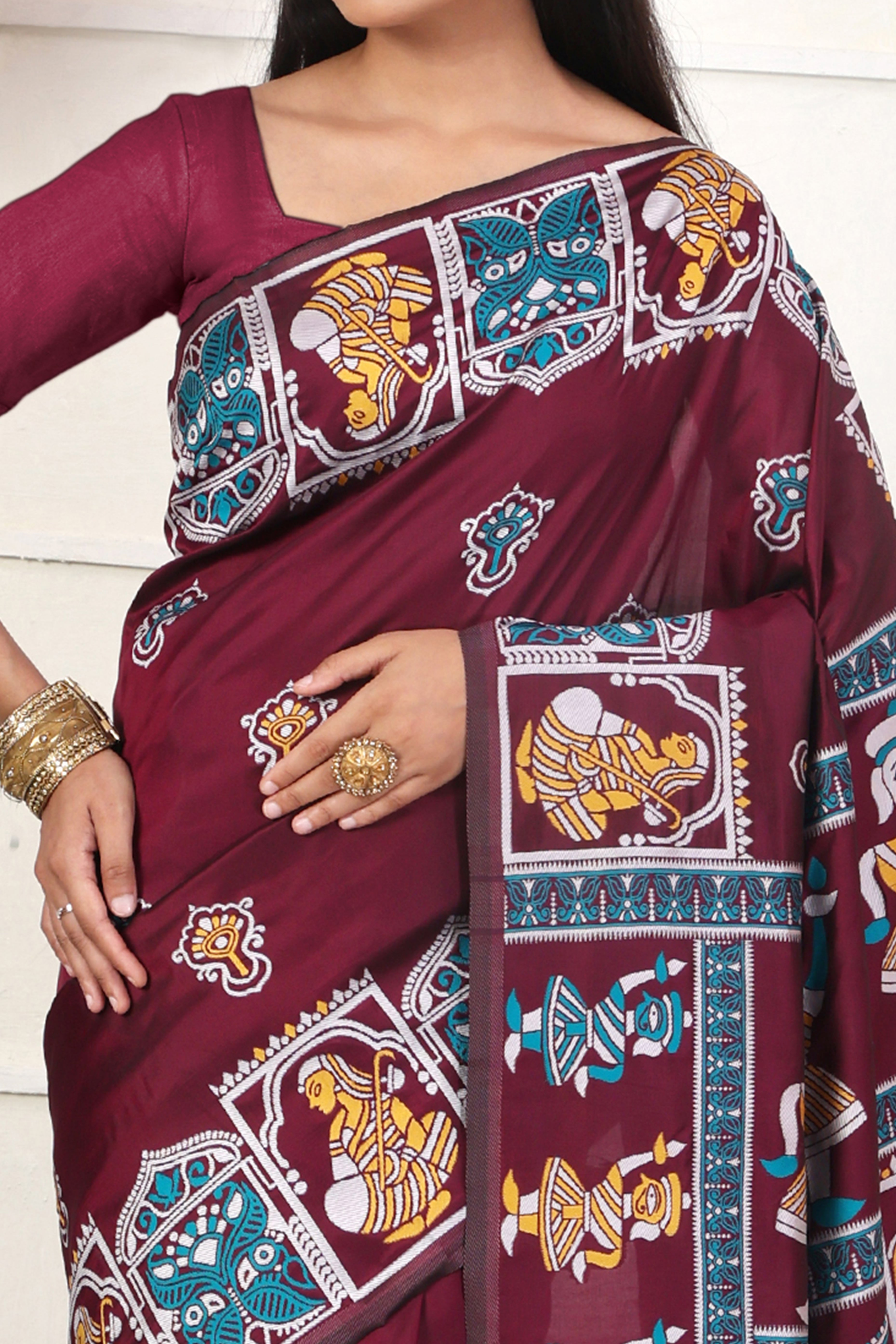 Dark Wine Ethnic Madhubani Print Silk Blend Saree Enhanced With Tassel Pallu Accents