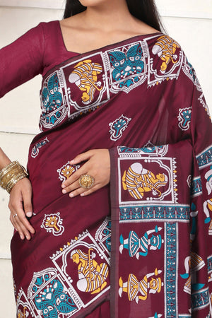 Dark Wine Ethnic Madhubani Print Silk Blend Saree Enhanced With Tassel Pallu Accents