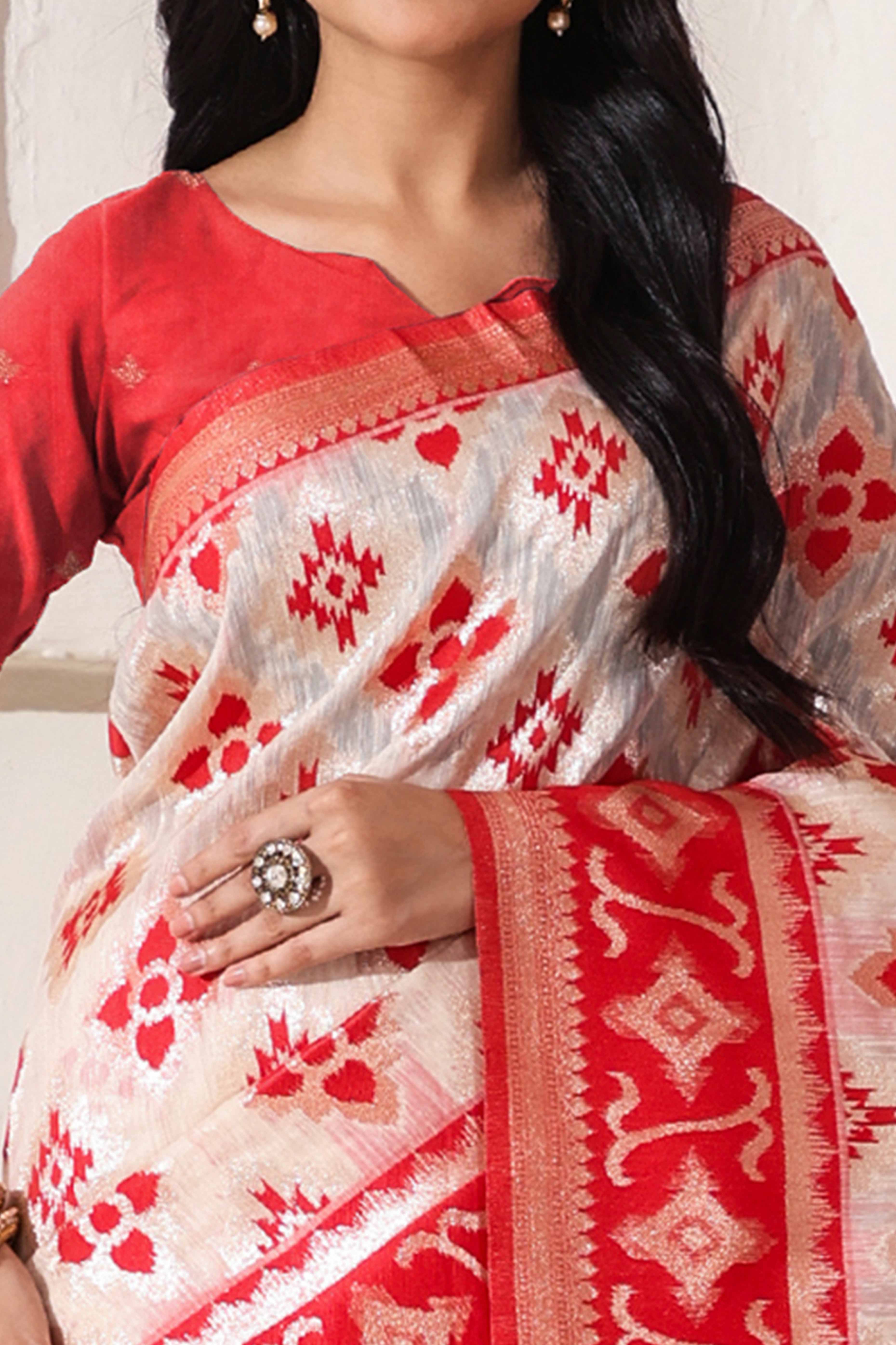 Traditional Zari Weaving On White & Red Linen Cotton Saree With A Charming Tassel Pallu
