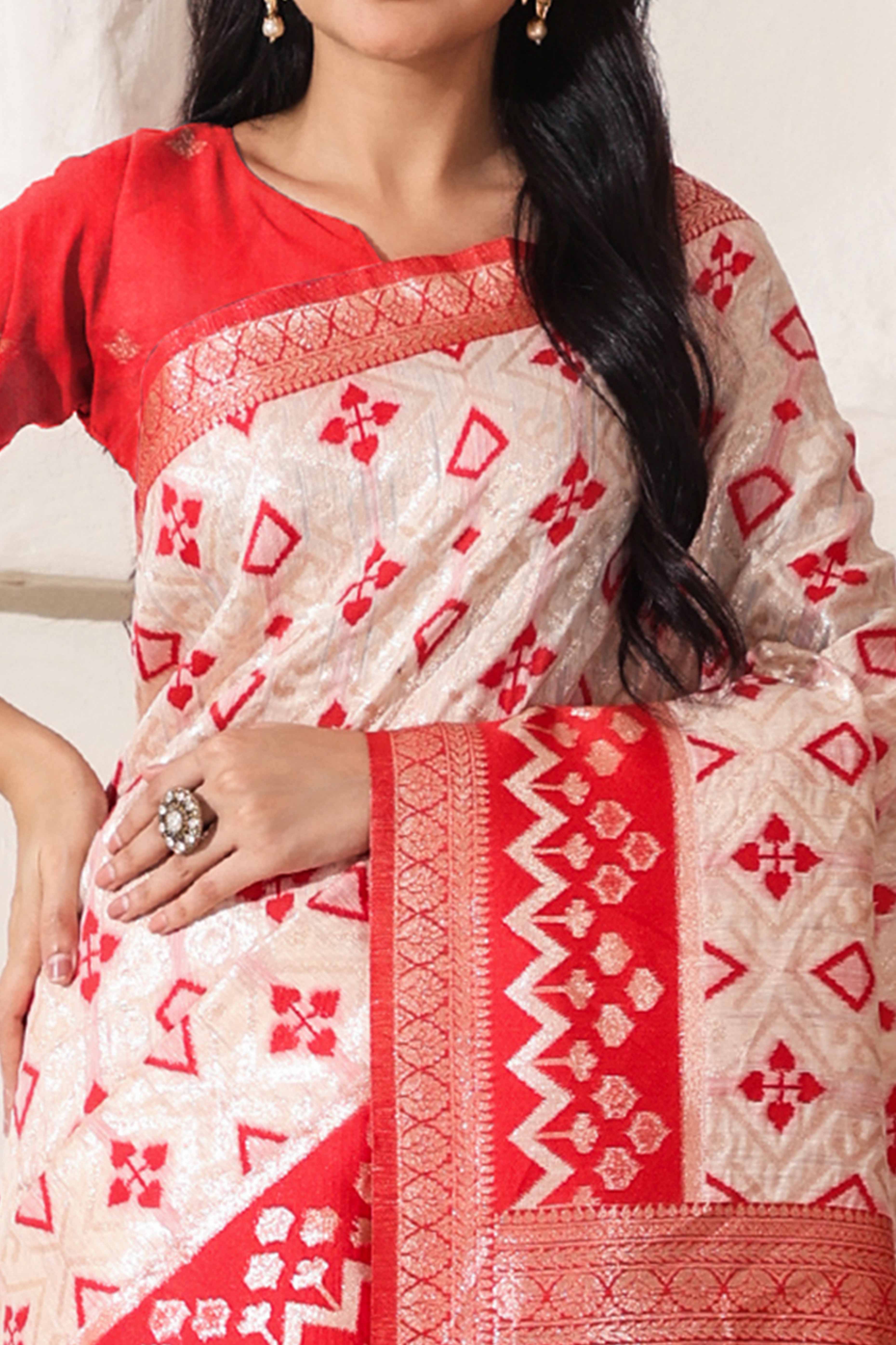 Graceful White & Red Saree In Linen Cotton With Fine Zari Weaving And Flowing Tassel Details