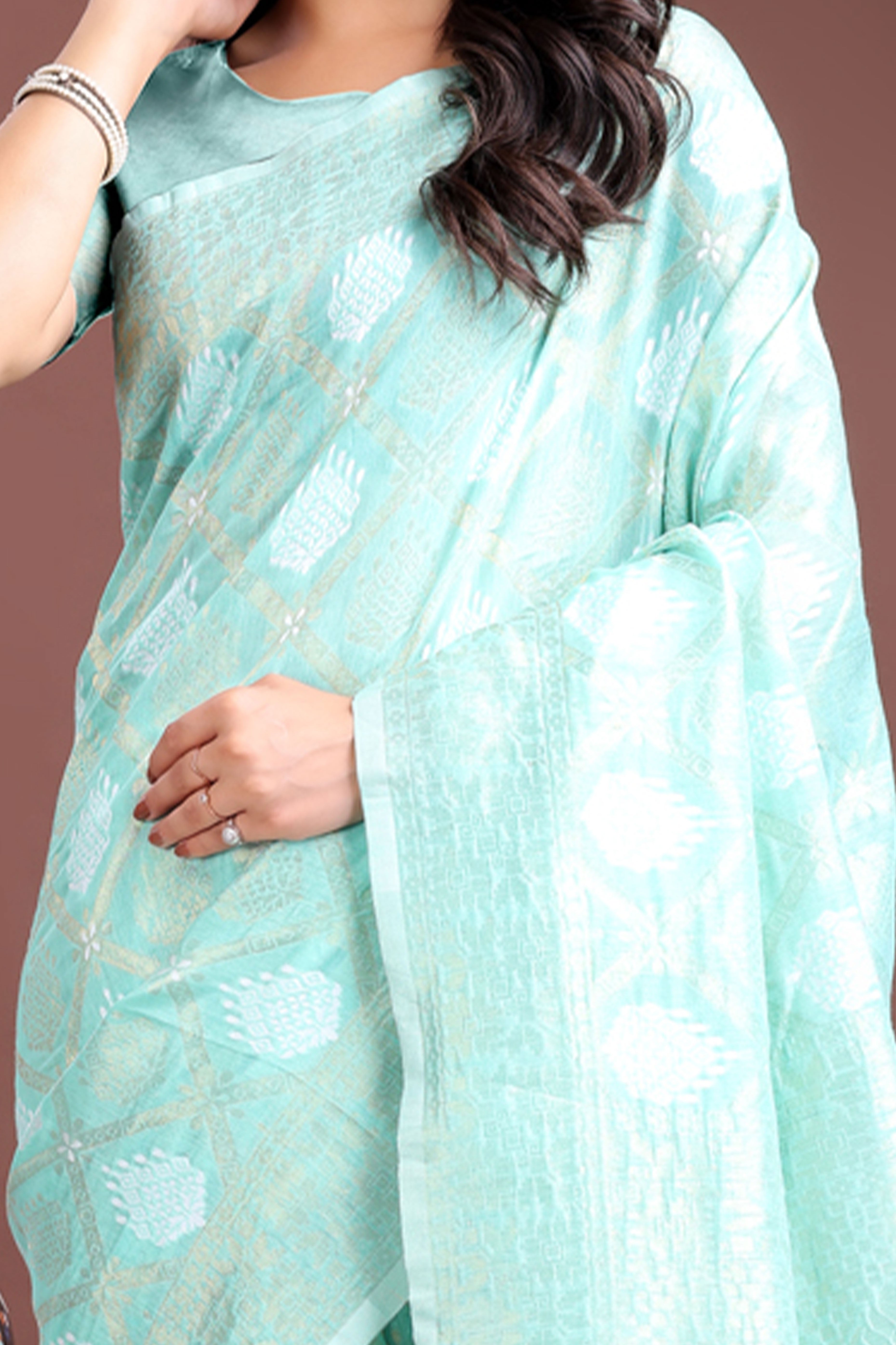Sea Green Zari Woven Linen Cotton Saree with Graceful Tassels