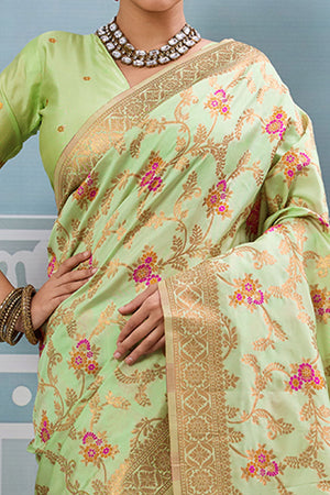 Majestic Bloom Pista Green Floral Zari Weaving Silk Blend Saree With Elegant Tassel Pallu