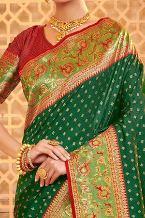 Elegant Dark Green Floral Zari Weaving Silk Blend Saree With Tassel Pallu