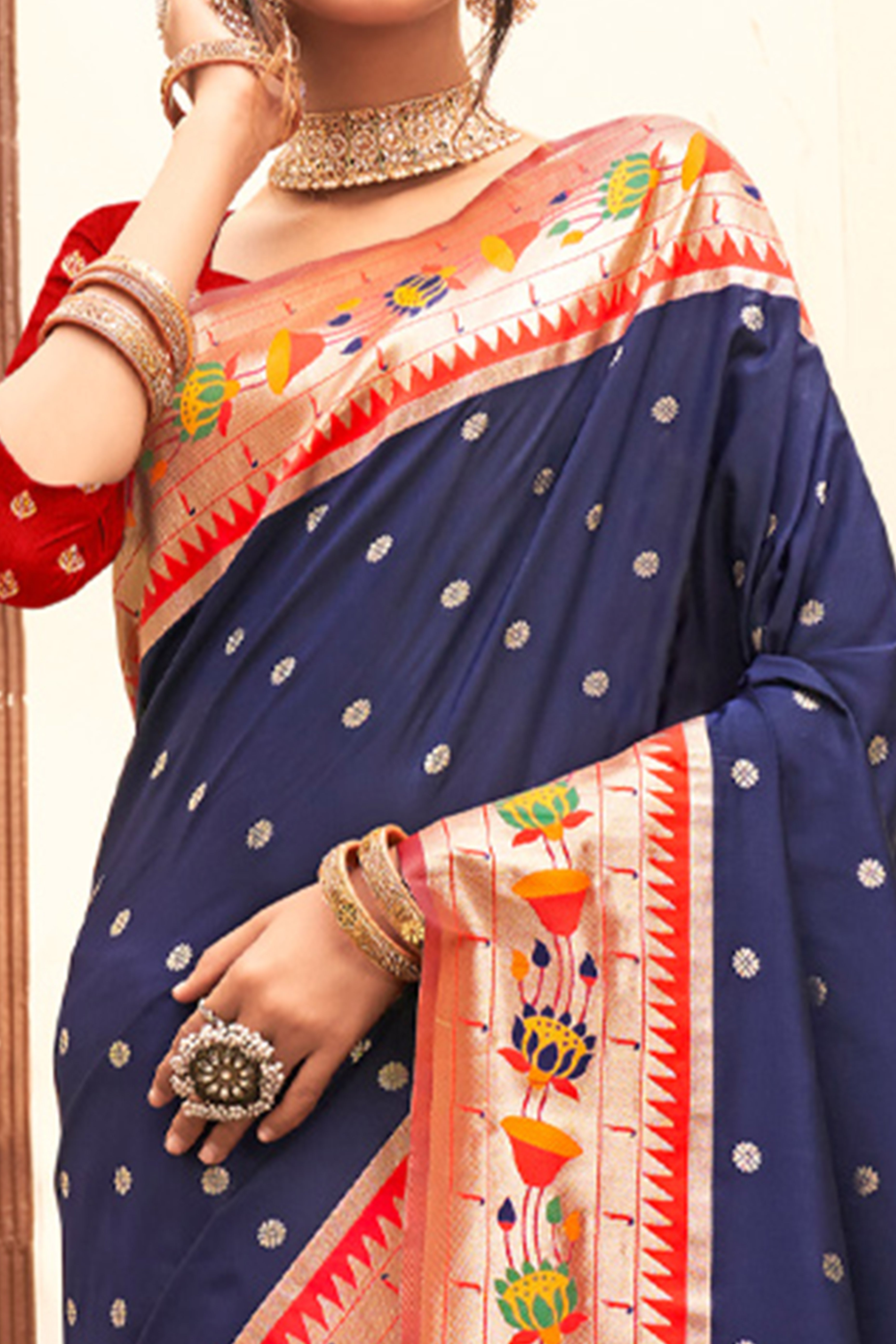 Charming Navy Blue Floral Zari Woven Silk Blend Saree With Stylish Tassel Pallu