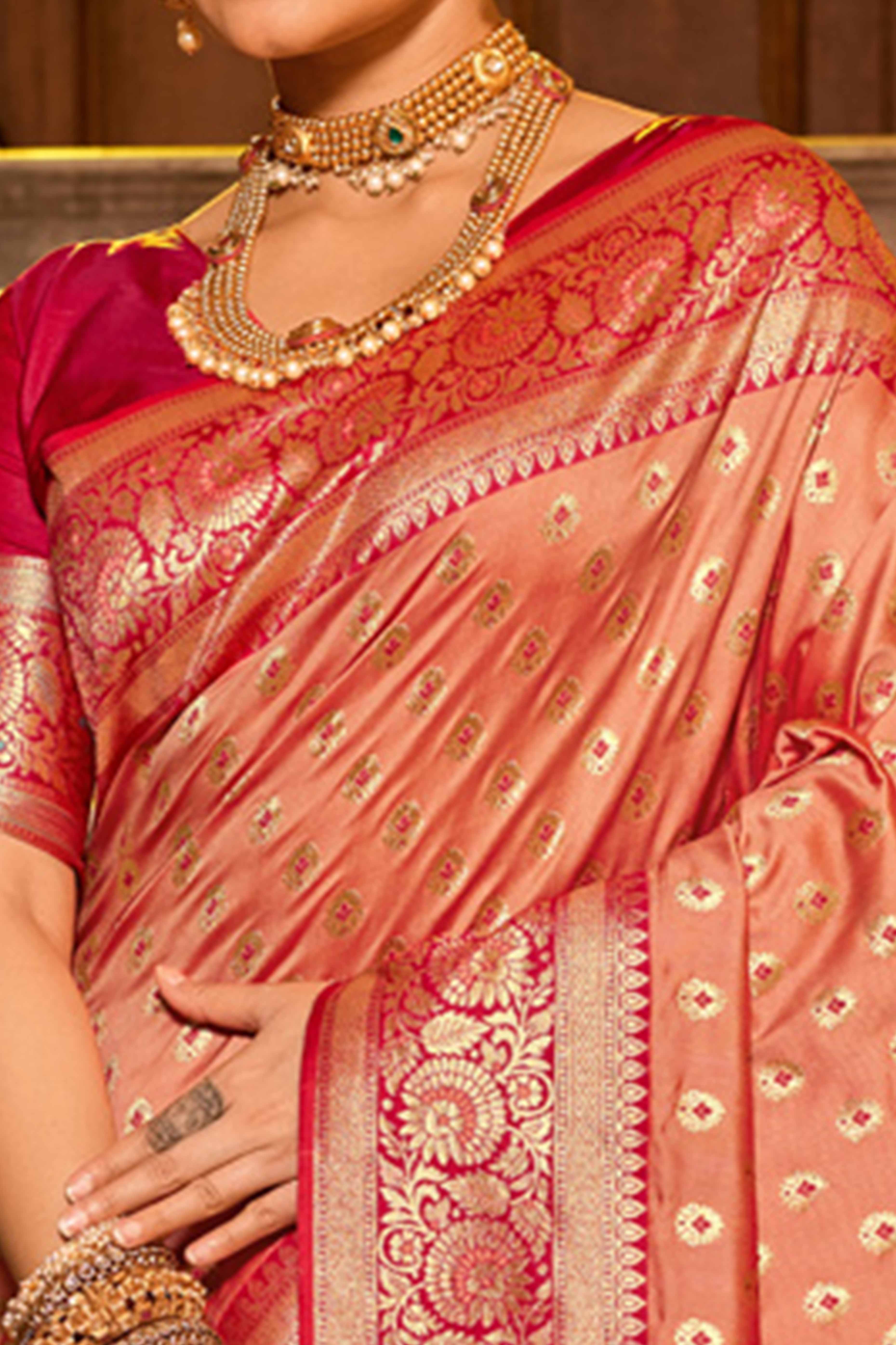 Peach Banarasi Silk Saree Featuring Intricate Floral Weaving & Elegant Tassel Pallu