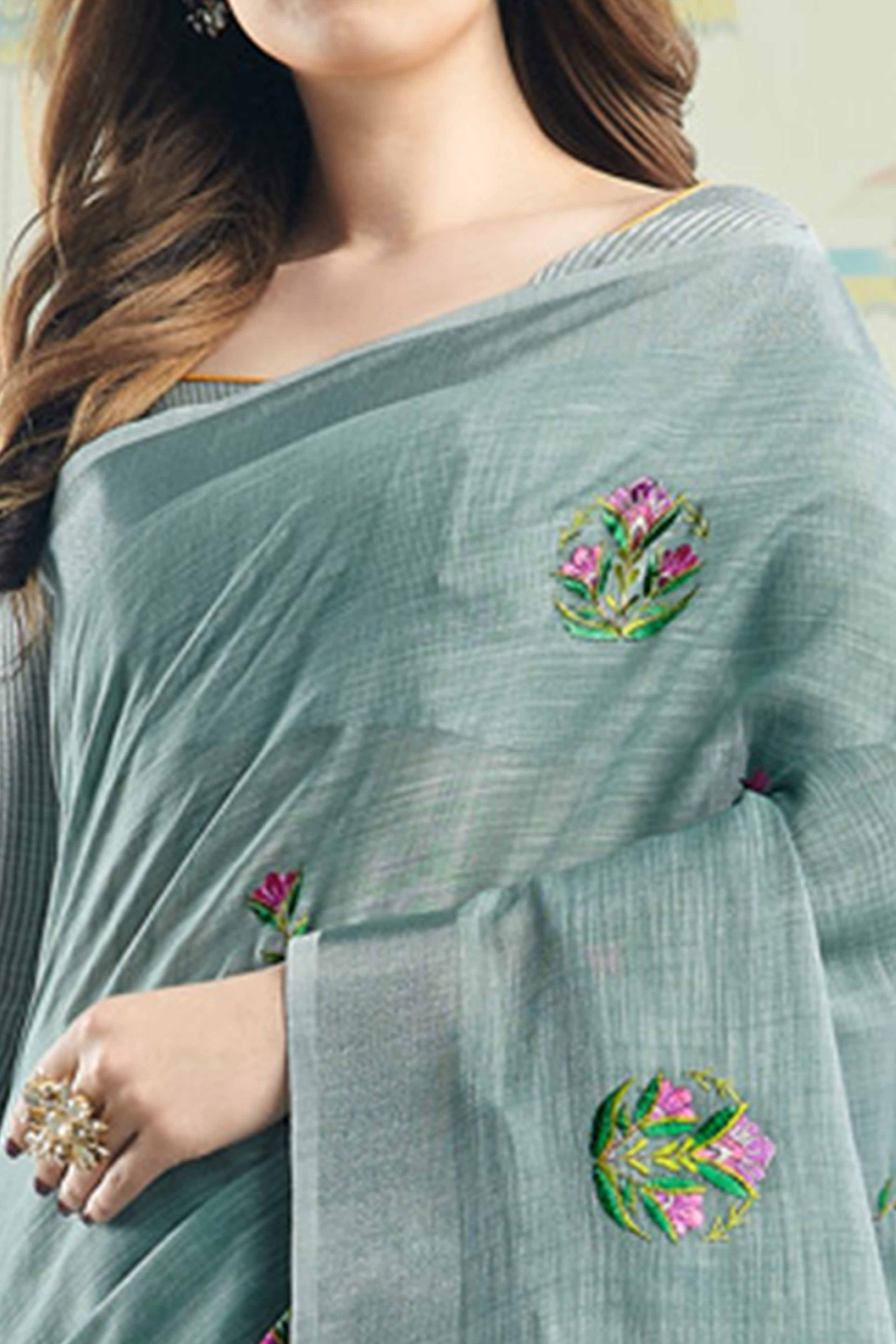Sea Green Linen Saree with Intricate Floral Embroidery and Classic Weaving