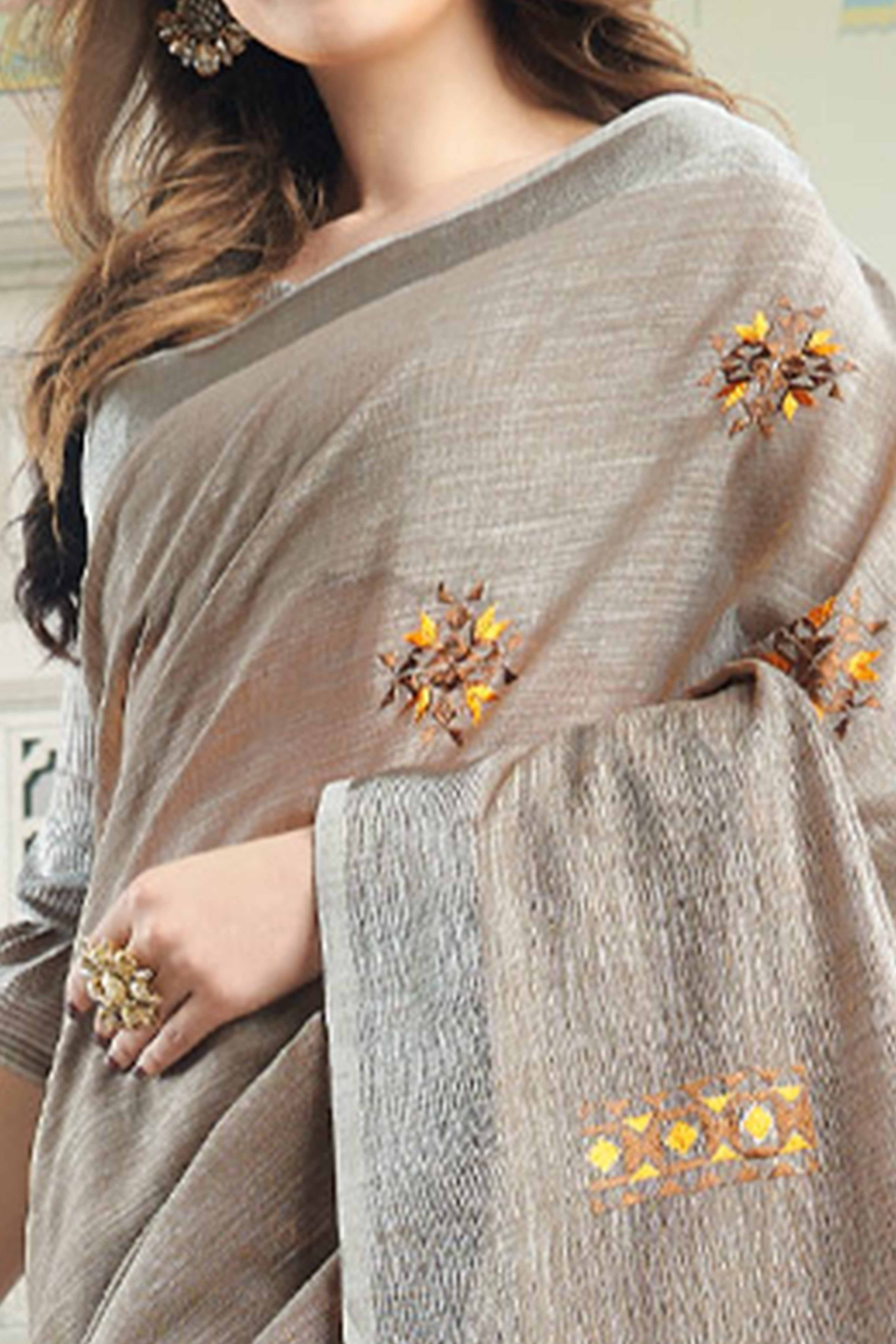 Light Beige Linen Saree with Intricate Floral Embroidery and Classic Weaving