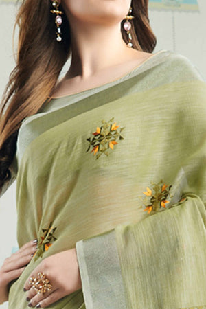 Pista Green Linen Saree with Intricate Floral Embroidery and Classic Weaving